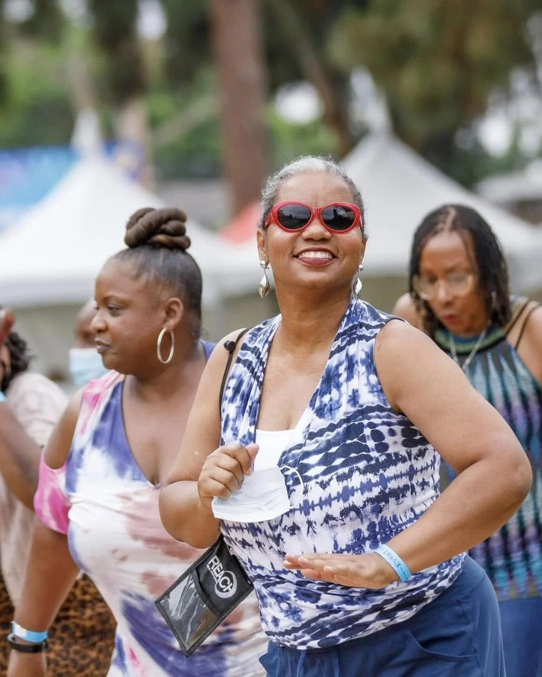 Guests enjoying a community event produced by Punch Productions.
