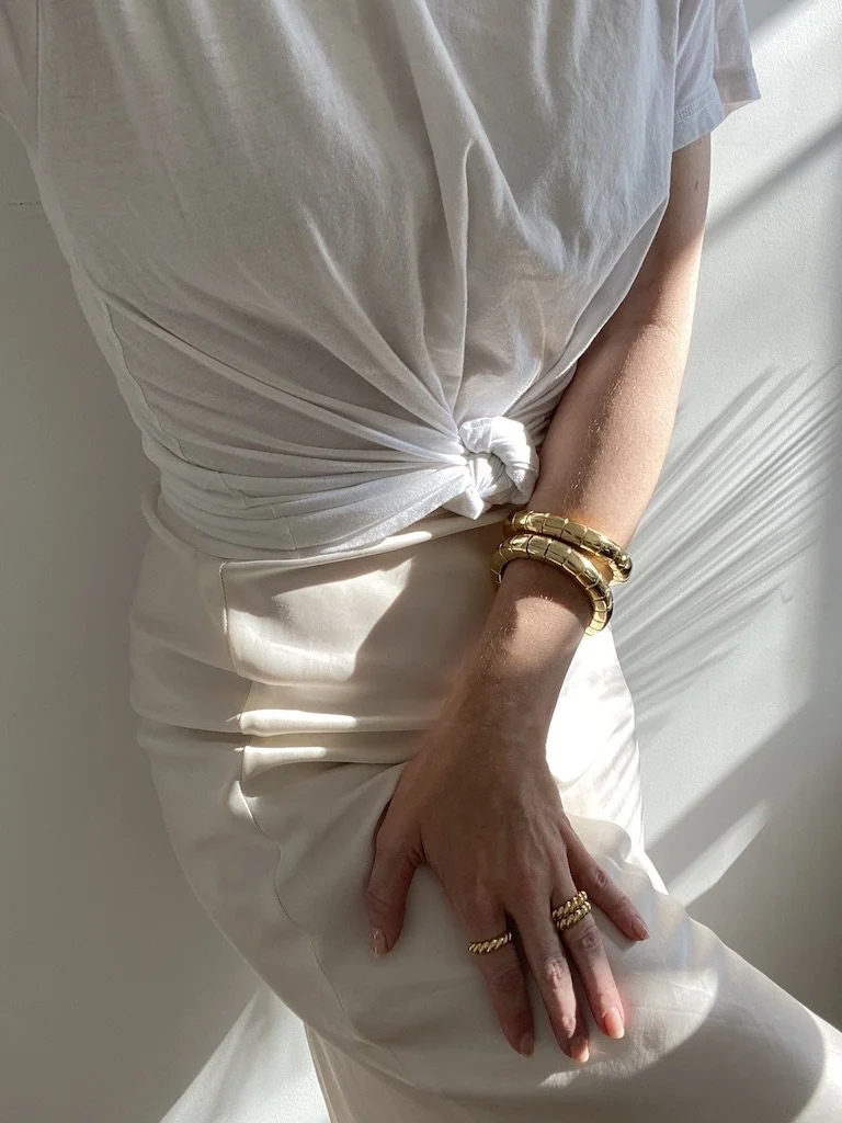 GoldBraceletsSilkSkirt.jpg