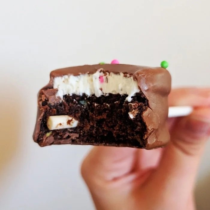 Chocolate Funfetti cake pop with vanilla buttercream filling