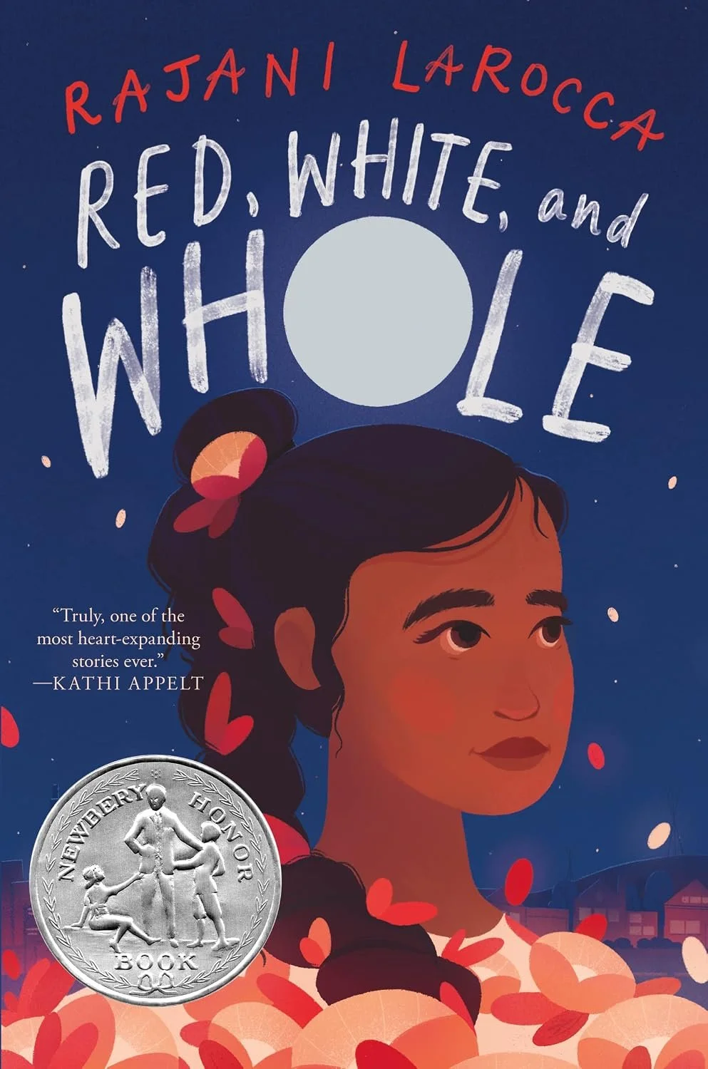 Book cover for 'Red, White, and Whole' by Rajani LaRocca, featuring an illustration of a girl with dark hair, a bun with a flower, and surrounded by falling leaves against a night sky with a full moon.