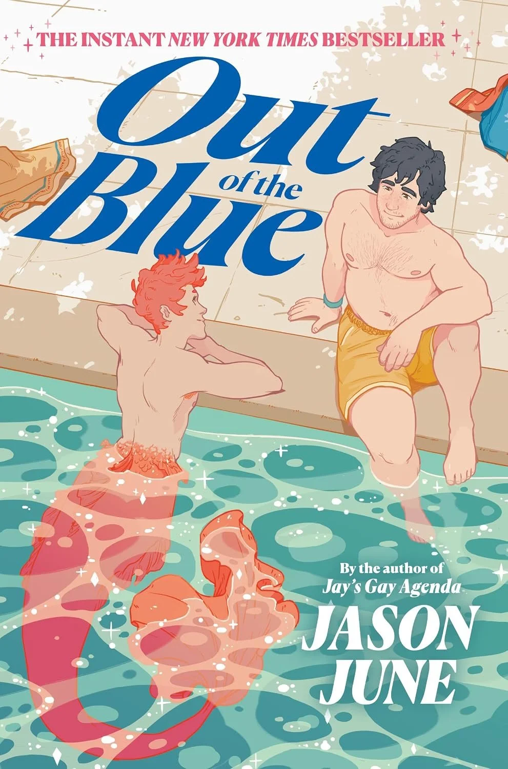 Illustration of two men by a swimming pool, one with red hair and a fish tail, the other with black hair, in swimwear; pool water with reflections, poolside with towels. The image promotes the book 'Out of the Blue' by Jason June.