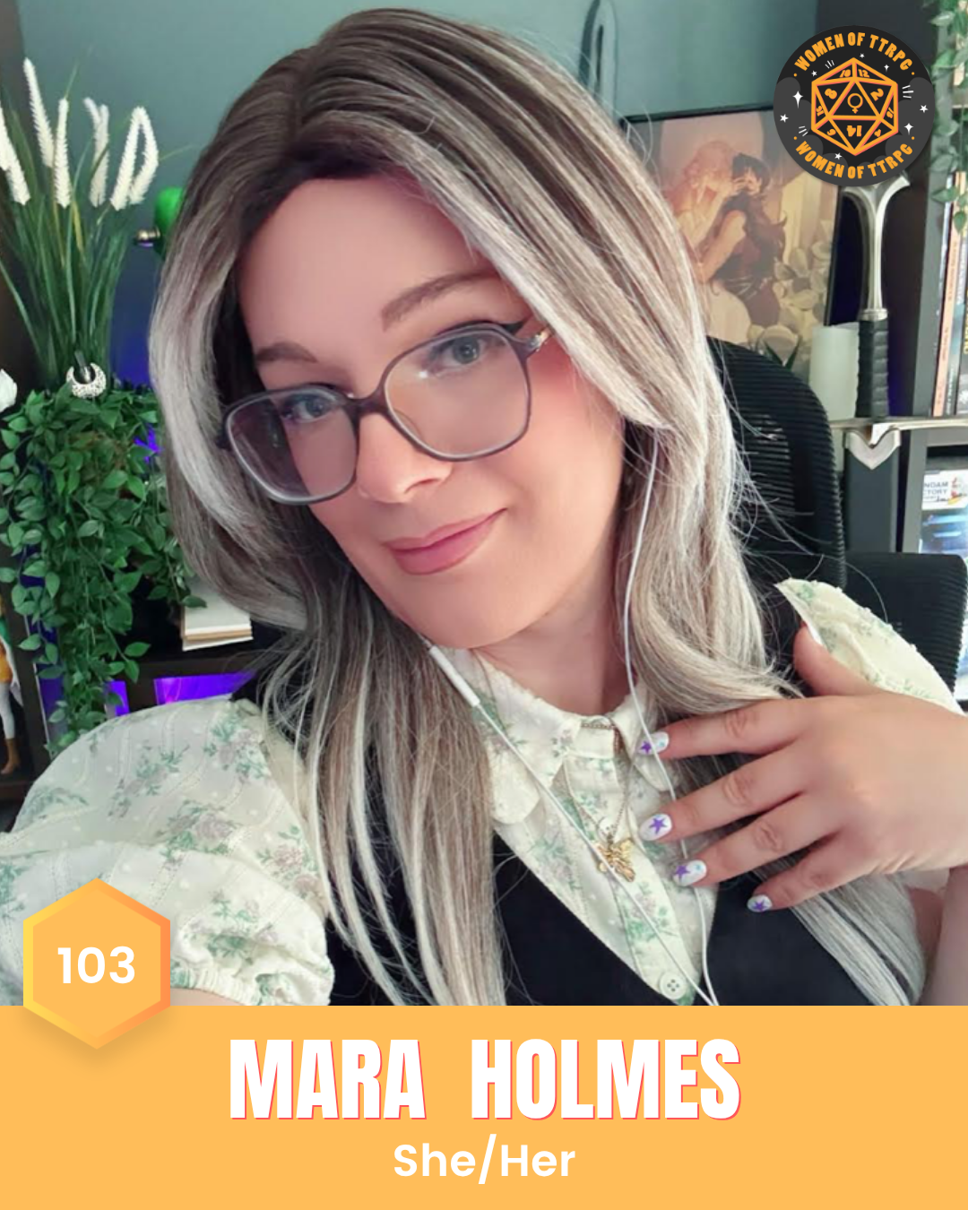 Mara Holmes (she/her). long blonde hair, wearing glasses and light makeup with white earphones.