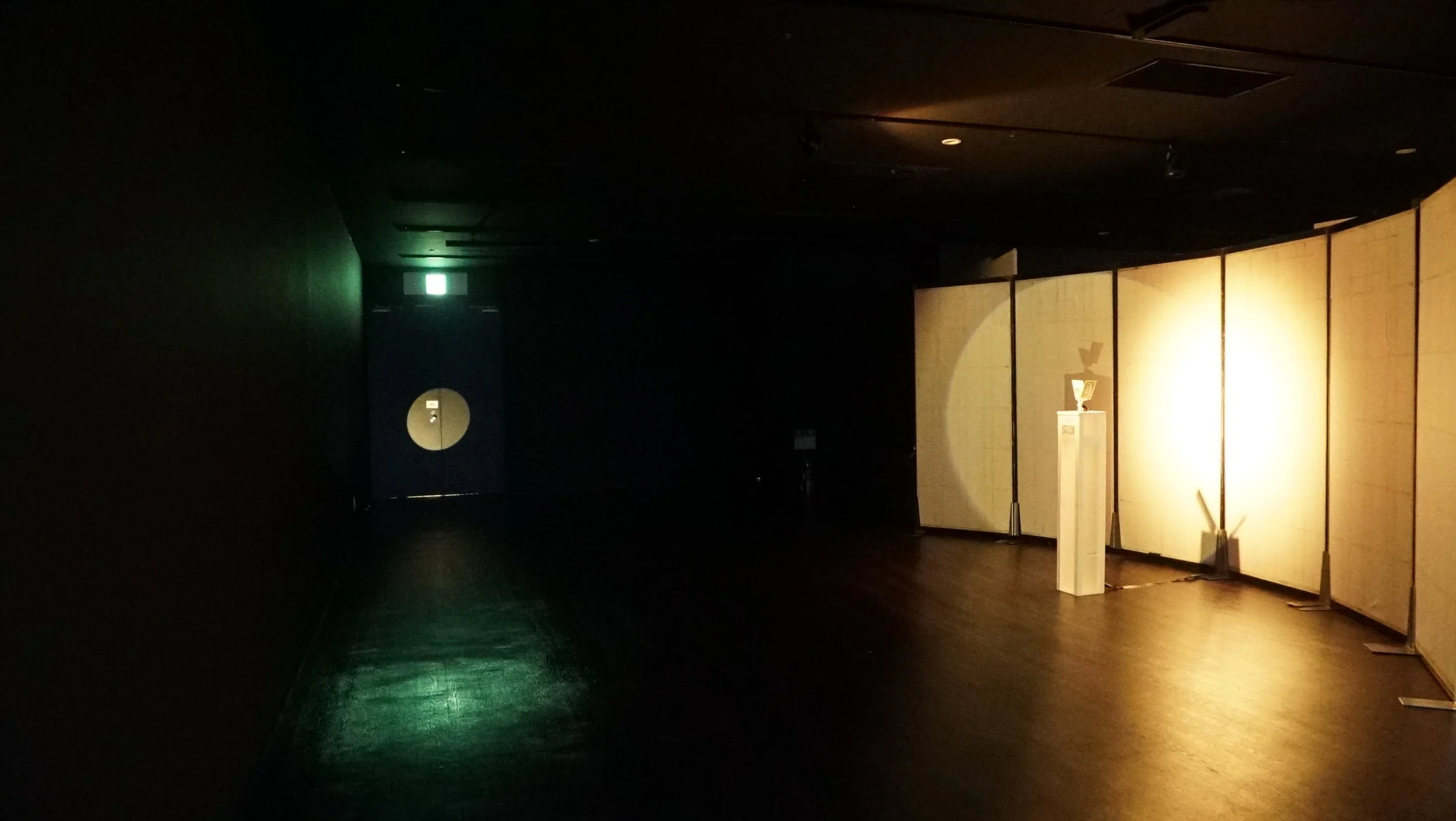 Immersive ‘Future’ environment featuring Graham Fudger's kinetic artwork within a hazy, illuminated space.