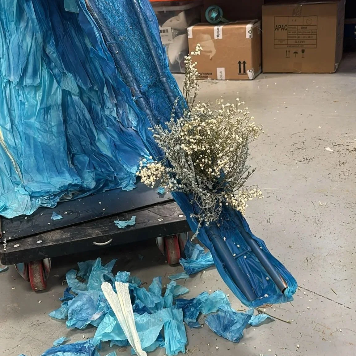 Work in progress evidence image showing a hand made wave structure and bunches of gypsophila being used to create the 'crest'. 