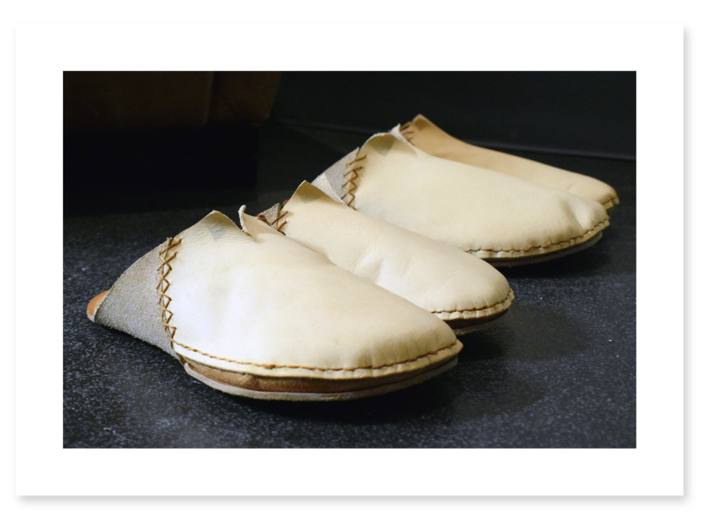 Four handmade leather slippers created as part of the Bovossuary immersive installation.