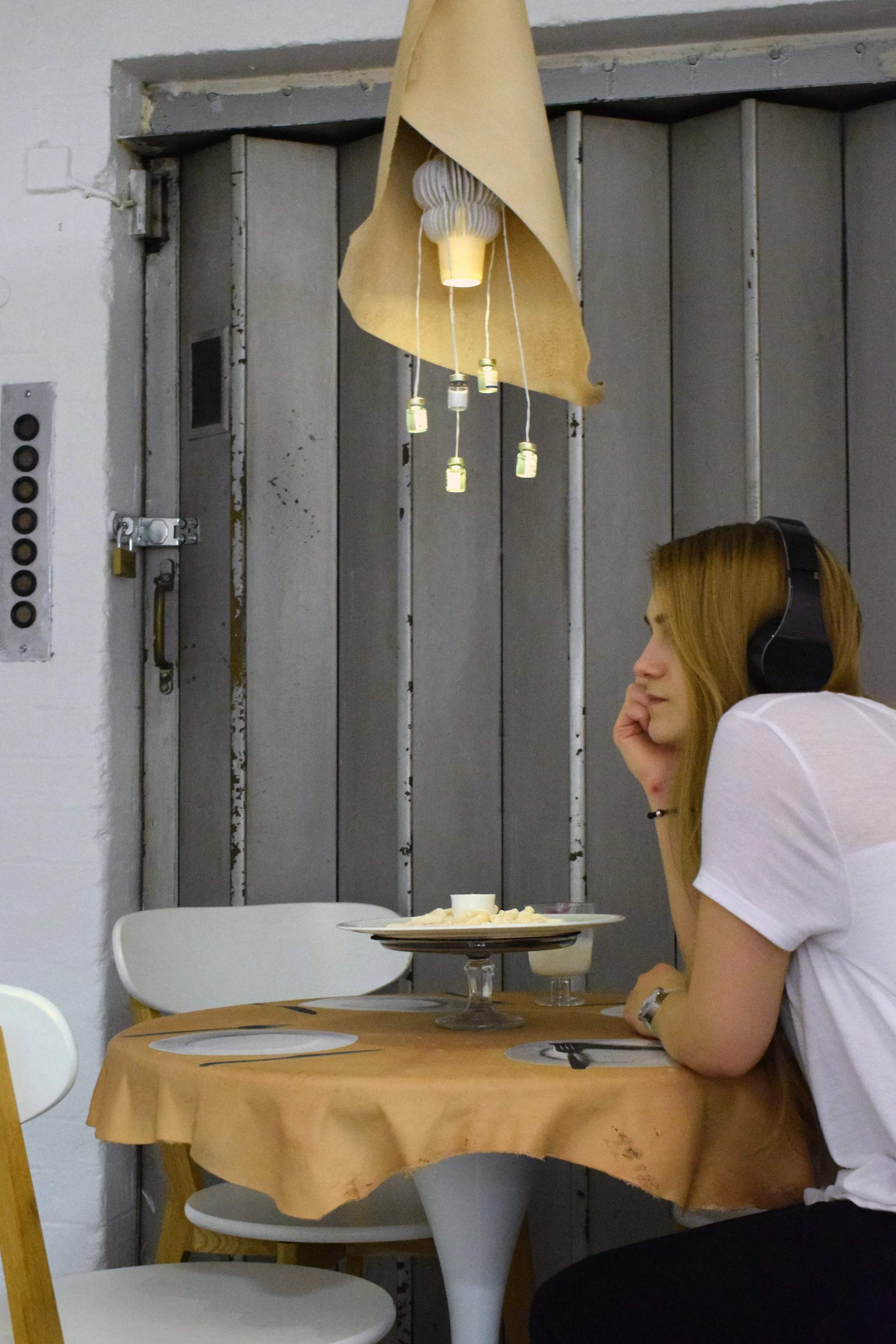 Participant wearing headphones during the guided multi-sensory experience.