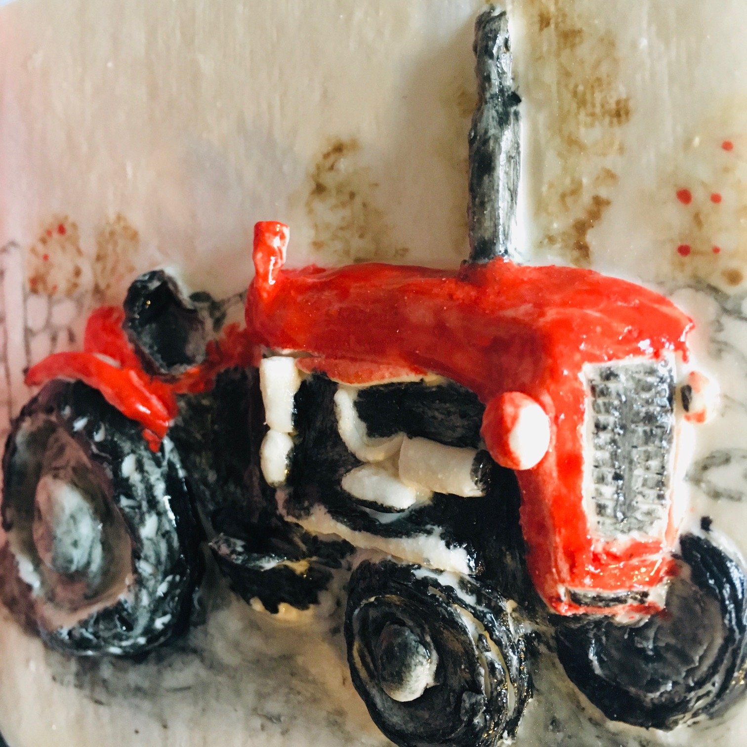 Red massey ferguson tractor design on a ceramic tile