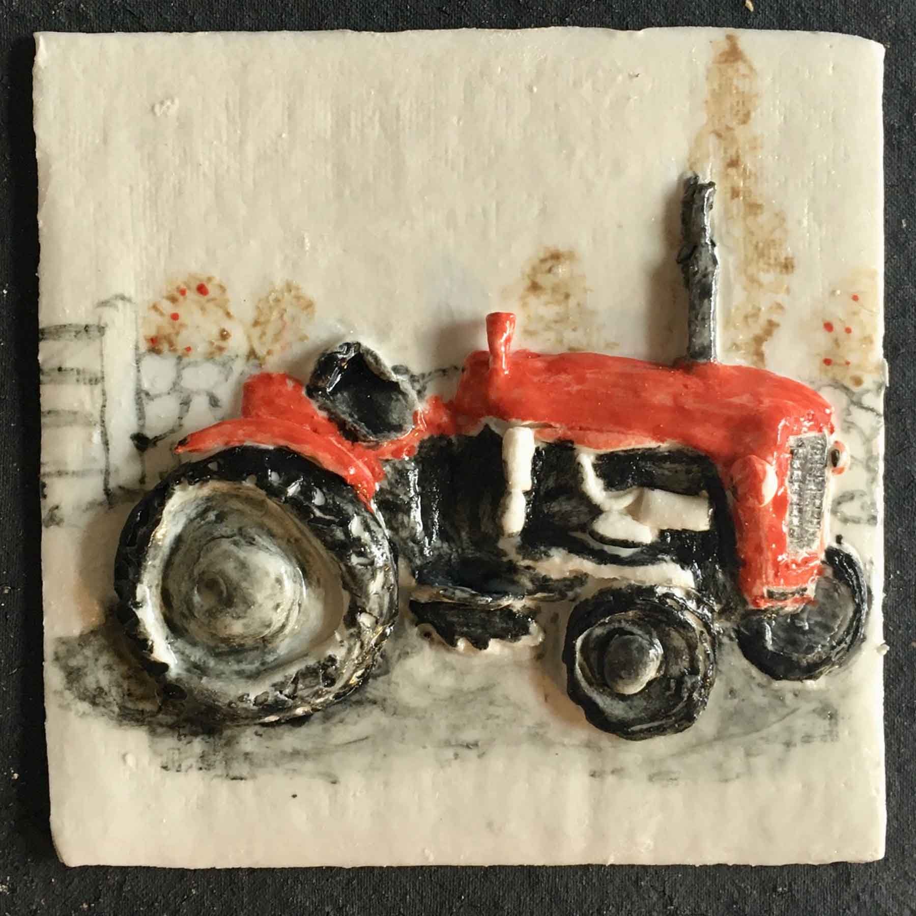 red tractor on a white ceramic tile