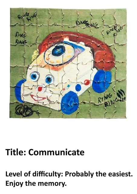 A jigsaw puzzle featuring a cartoon of a smiling, talking cartoon speech bubble with a face and headphones. The background is green, and the puzzle includes drawings of ringing phones with the word 'RING RING' written multiple times.