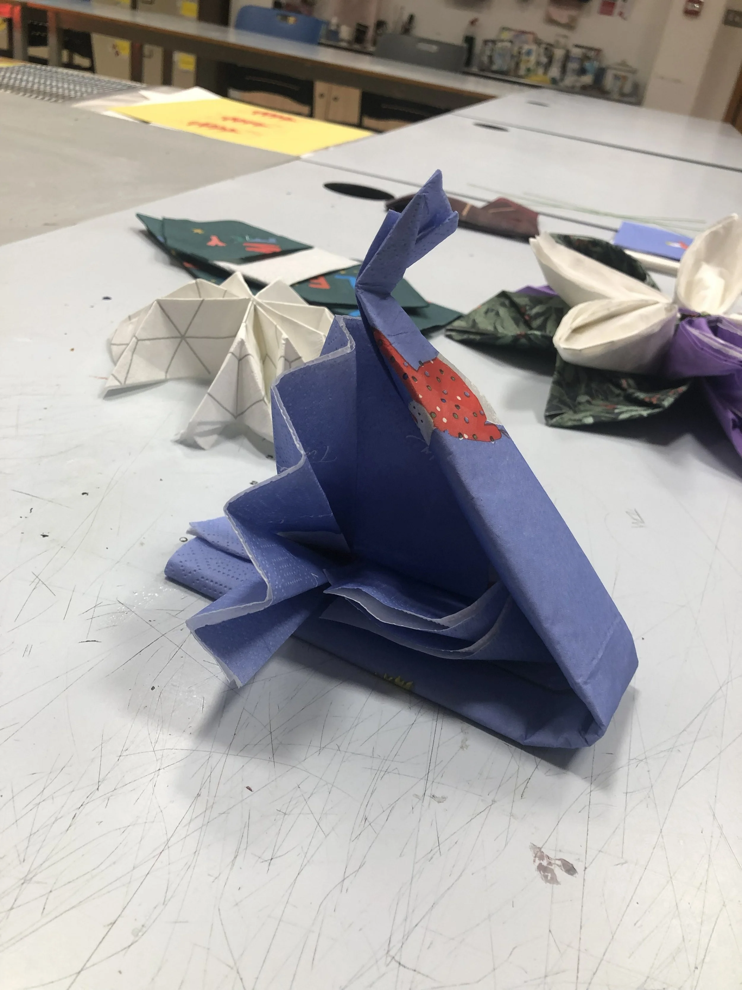 napkin folded in the shape of a turkey
