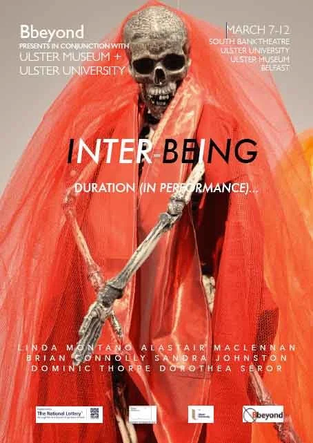 A skeleton dressed in a red dress and veil, holding a staff, on a poster for a performance titled 'Interbeing' presented by Beyond in collaboration with Ulster Museum and Ulster University, scheduled for March 7-12 at South Bank Theatre, Ulster Museum in Belfast.