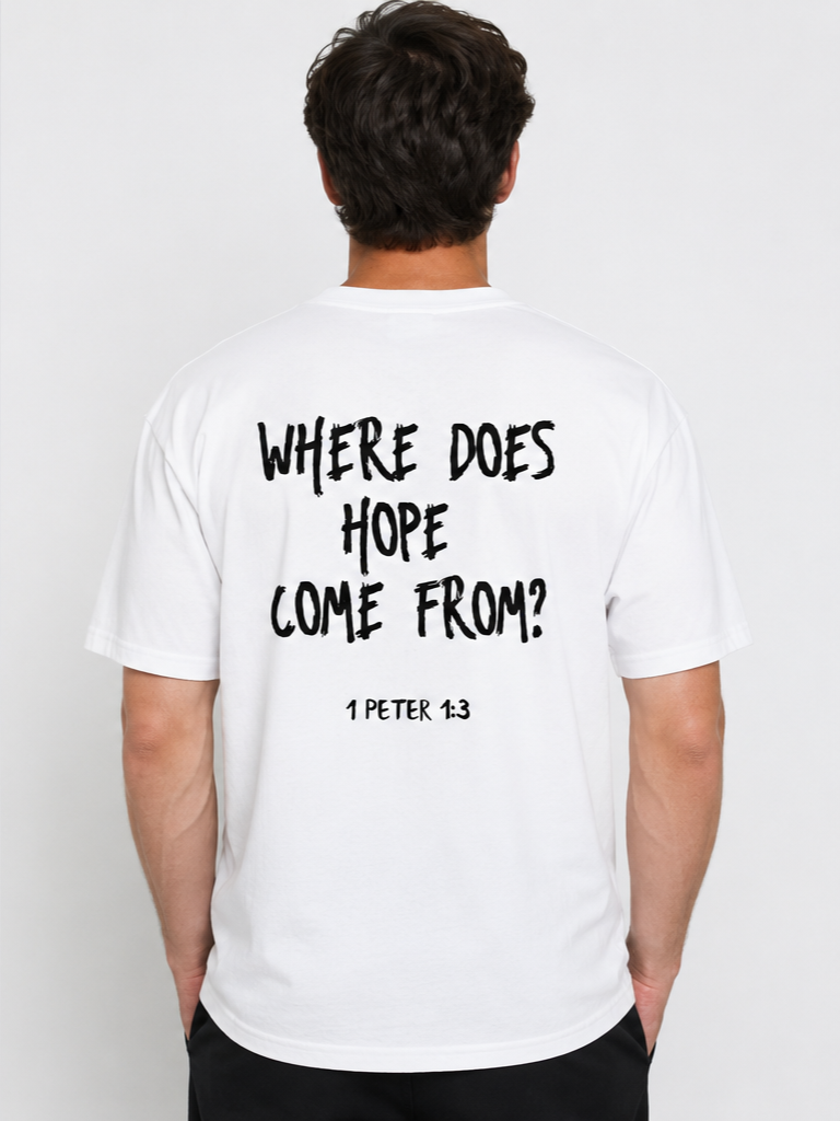 Back of a man wearing a white T-shirt with the text 'Where does hope come from?' and a biblical reference '1 Peter 1:3' written on it.