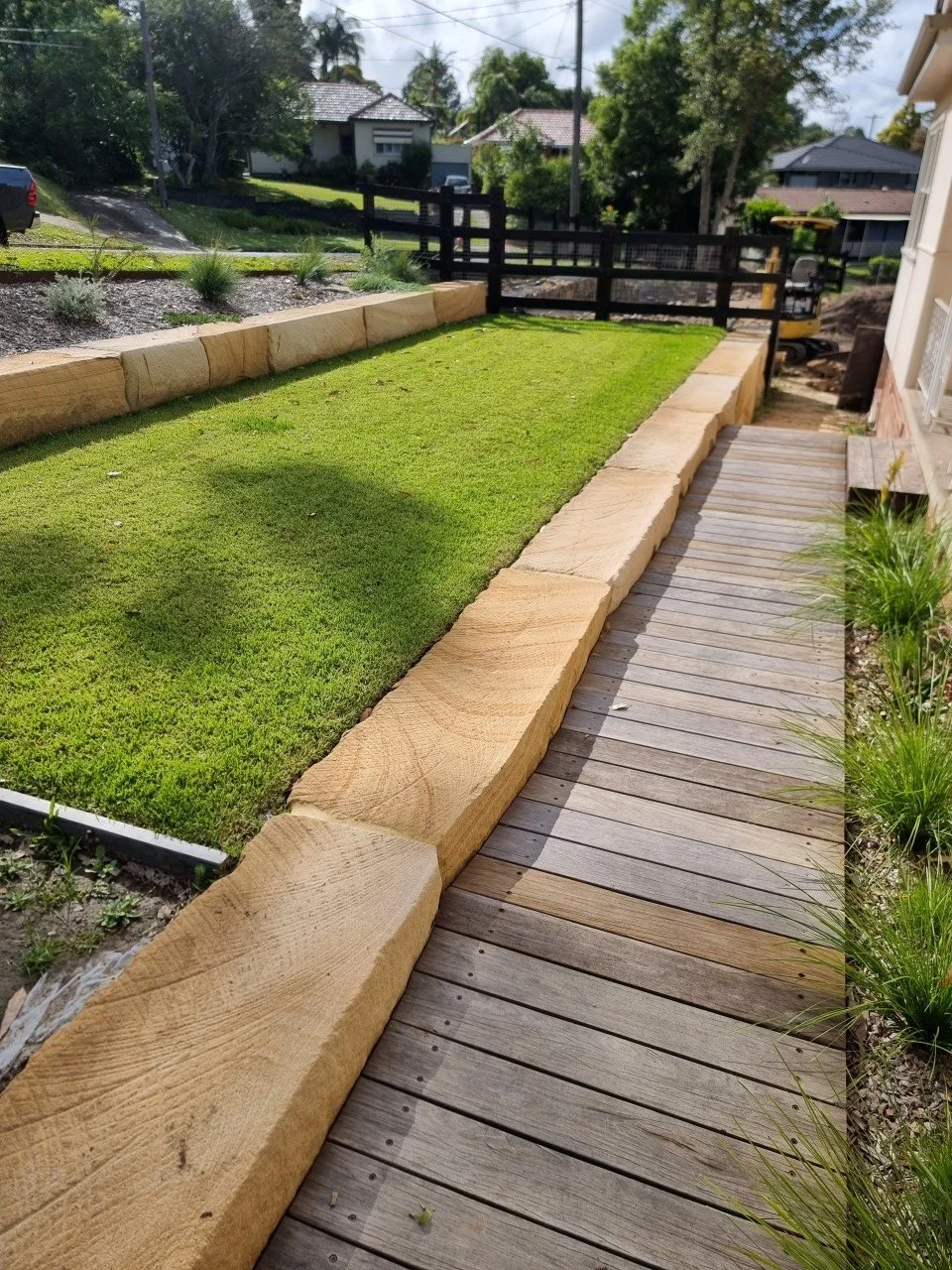 Sandstone log wall in turramurra