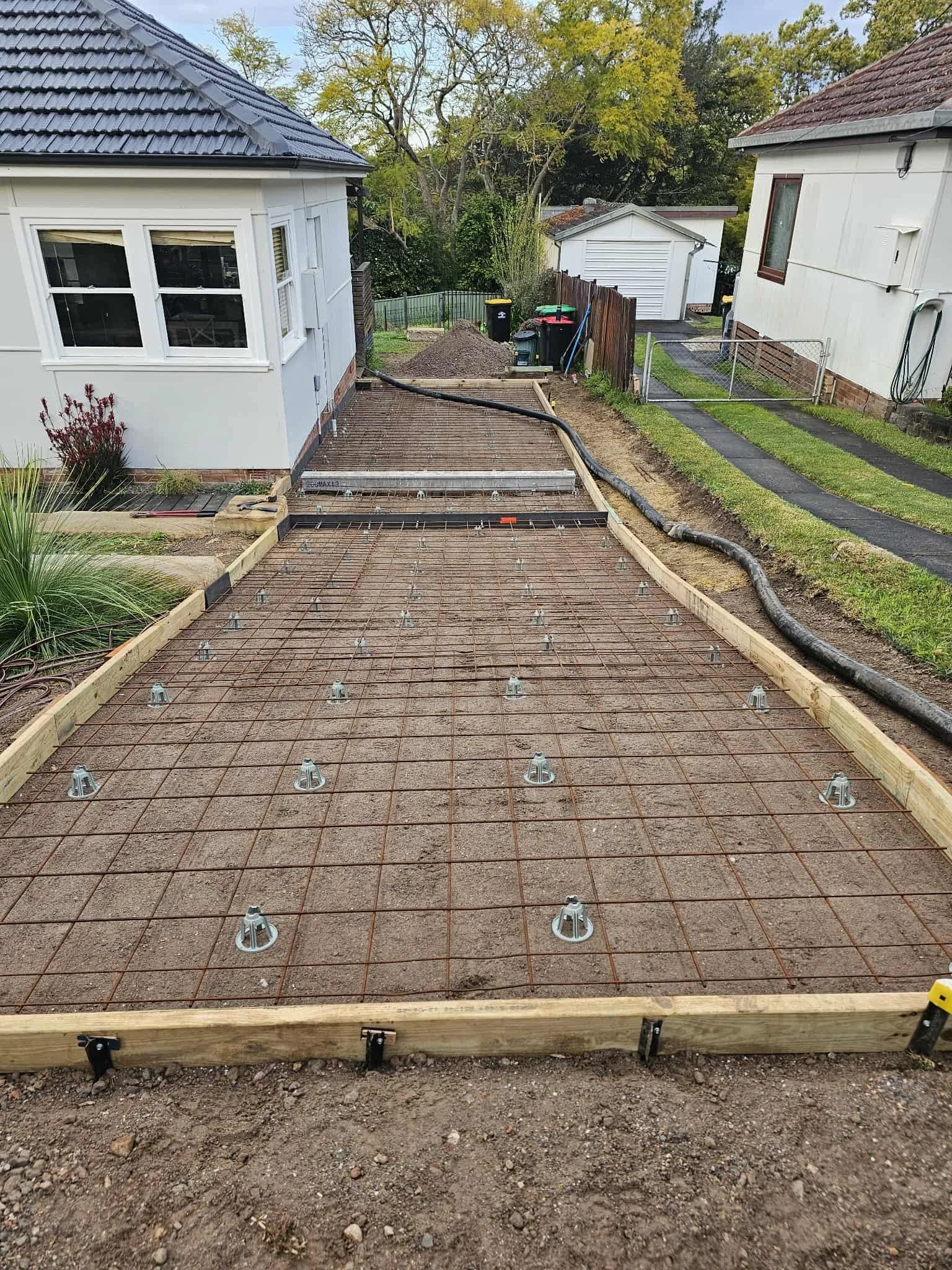 Excavation and ground preparation for a new residential driveway in St Ives