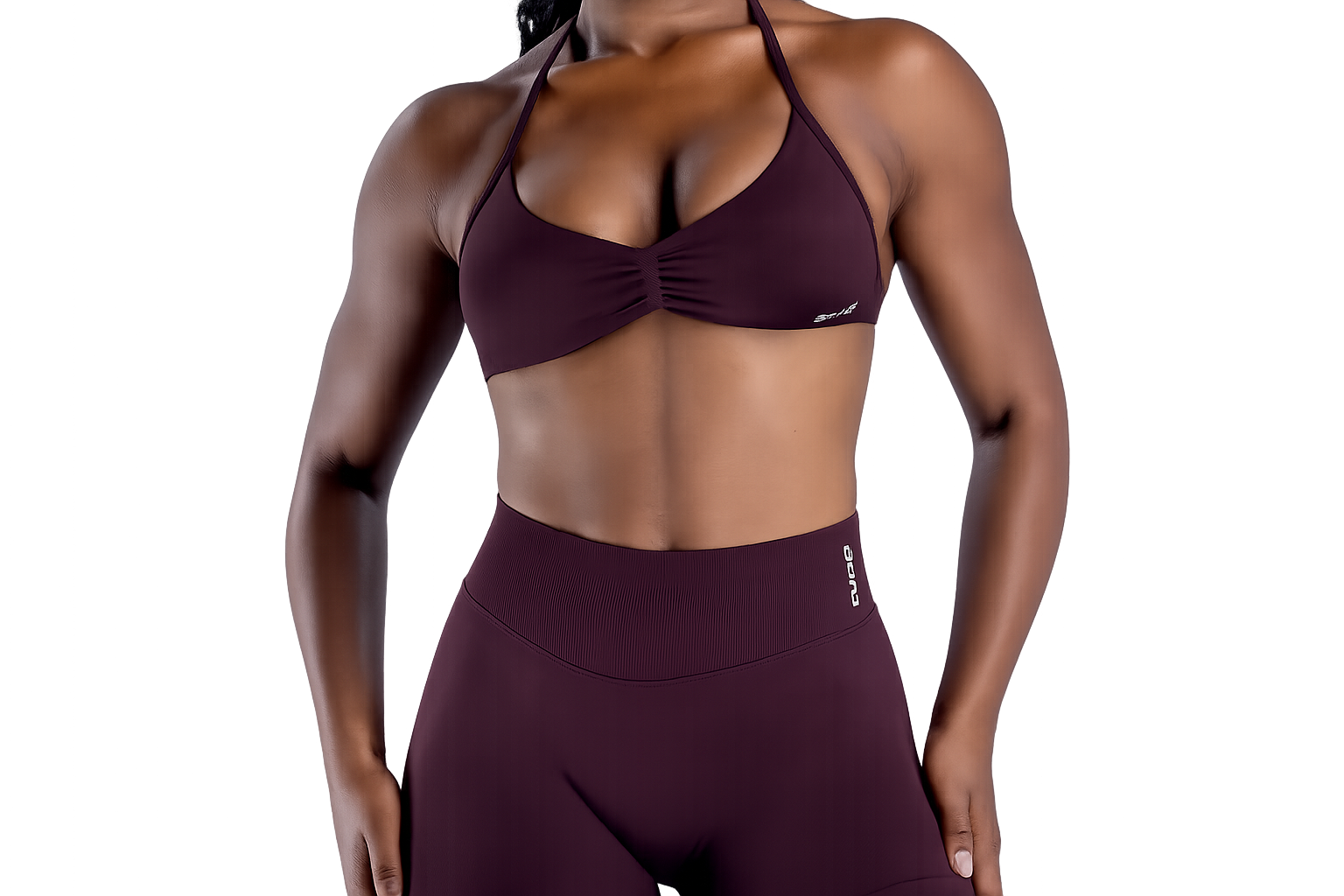 DFYNE brown sports bra and low waisted short showing the fit and desing