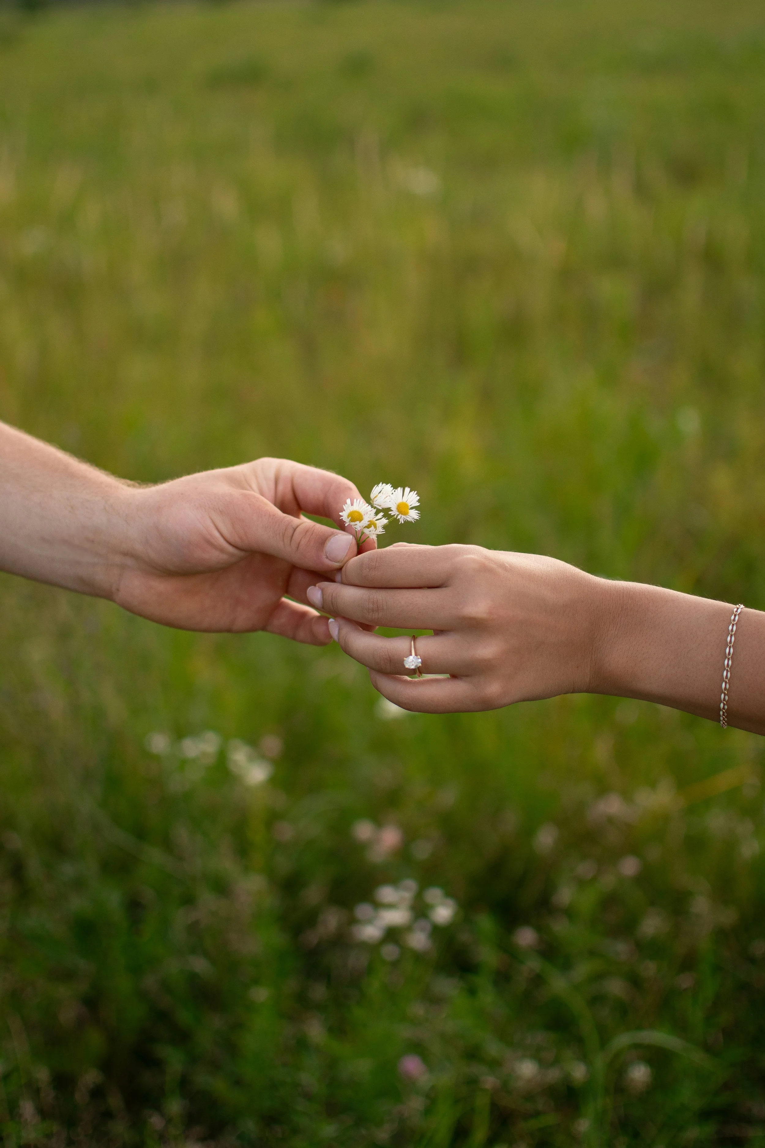 a married couple exchanging flowers