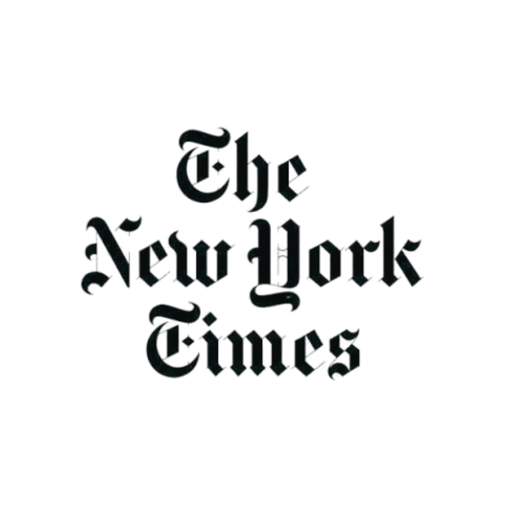 Dark background with the text 'The New York Times' in Gothic style font.