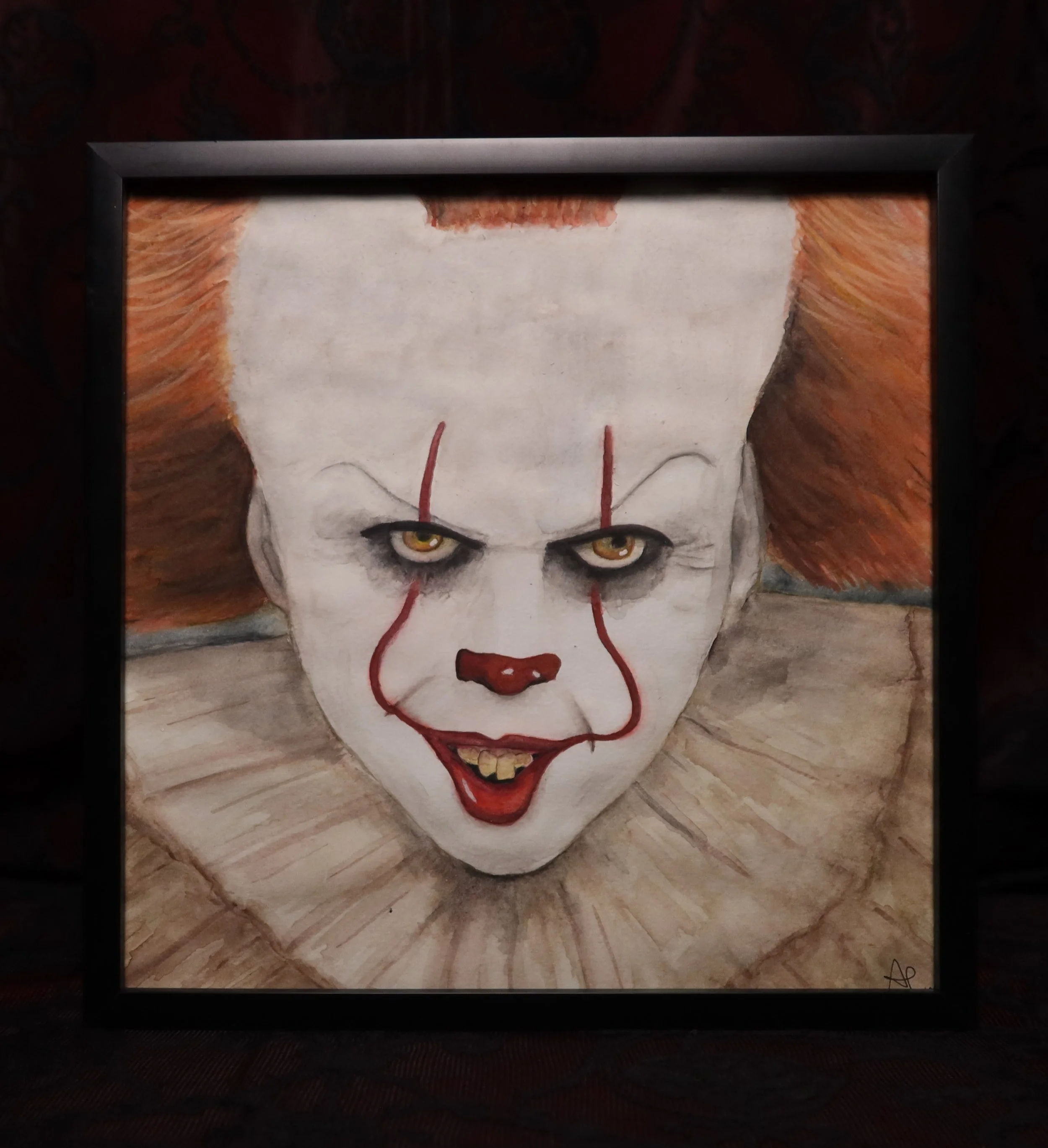 Close-up of Pennywise the clown from Stephen King's 'It'.