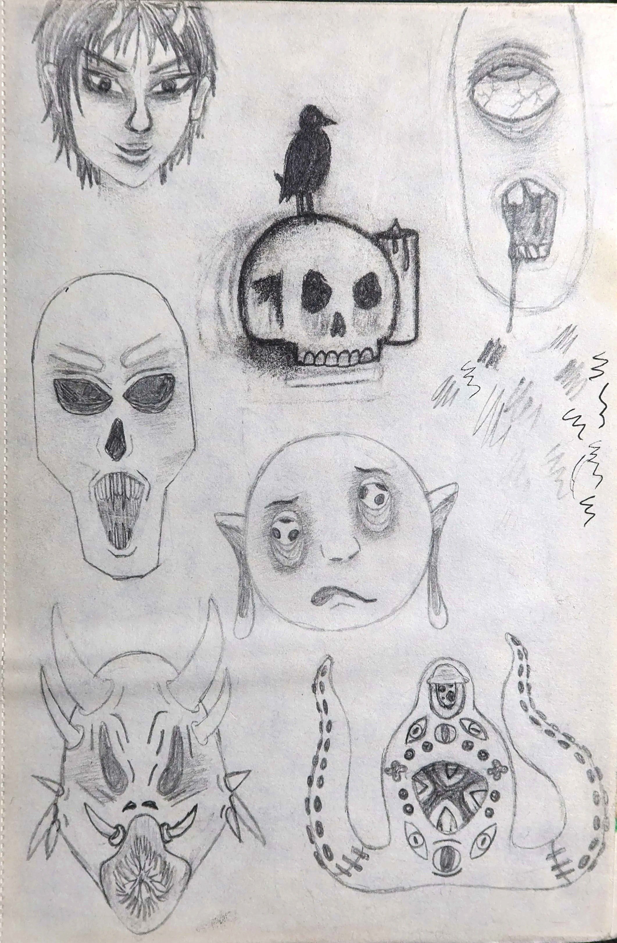 A collection of various hand-drawn sketches featuring skulls, faces, a bird perched on a skull, and abstract tribal patterns, all rendered in pencil.