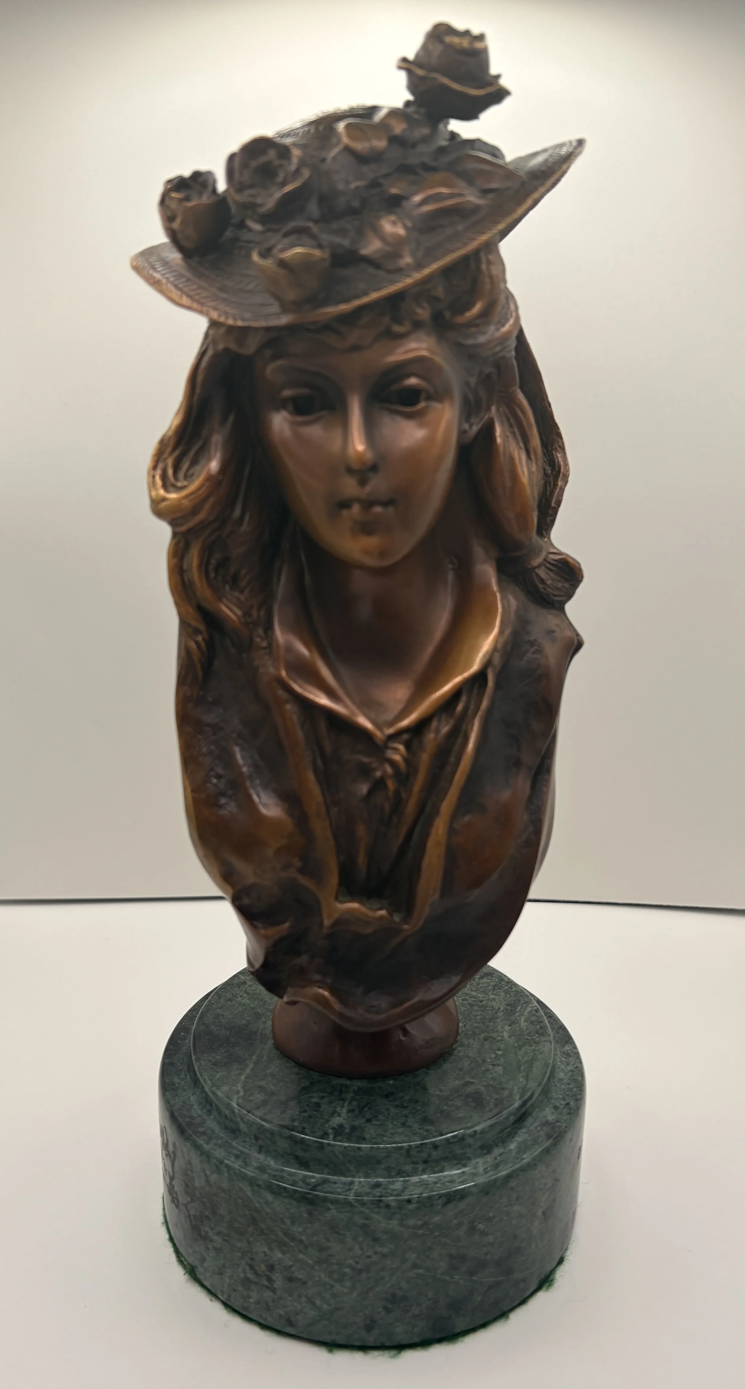 Gibson Girl - Bronze bust of woman in a floral hat with marble base