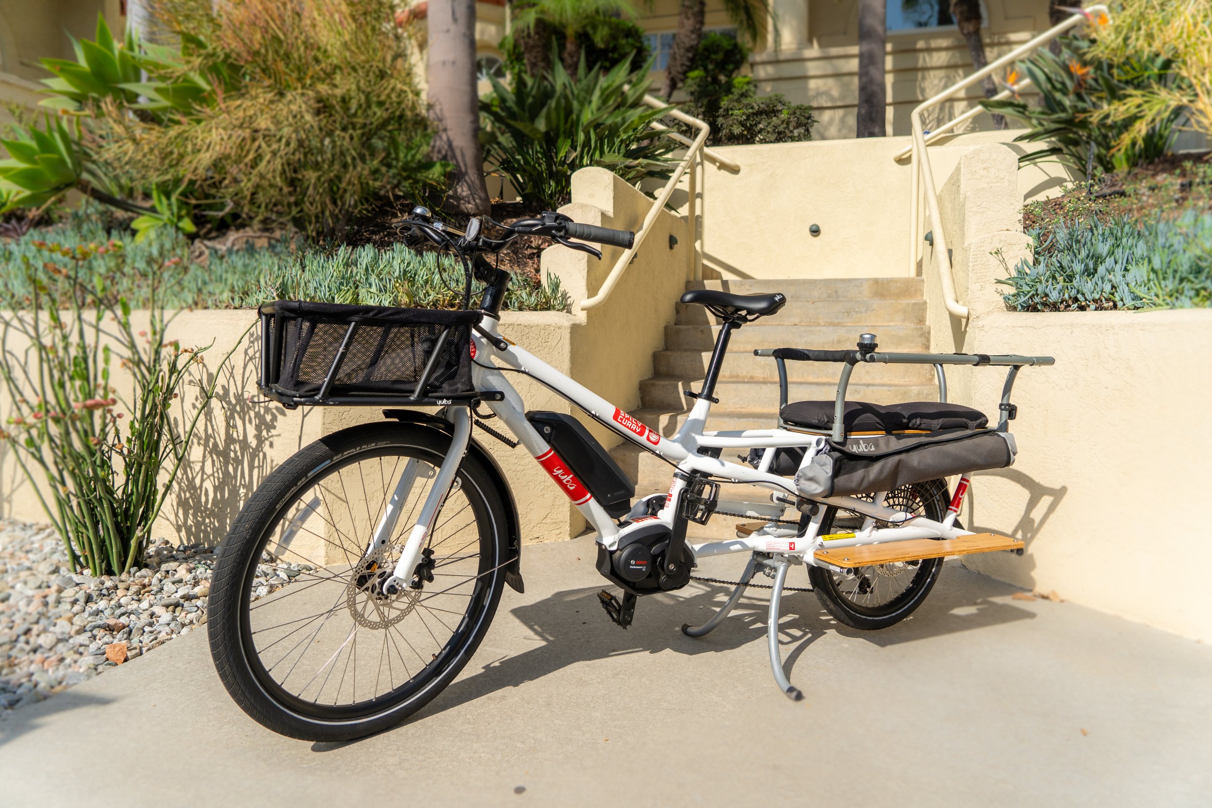 Yuba electric cargo bike available for guests at The Solana House, a luxury coastal vacation rental in Solana Beach, California