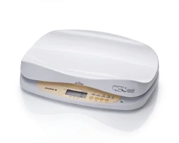A flatbed scanner with a closed lid, digital display, and control buttons.