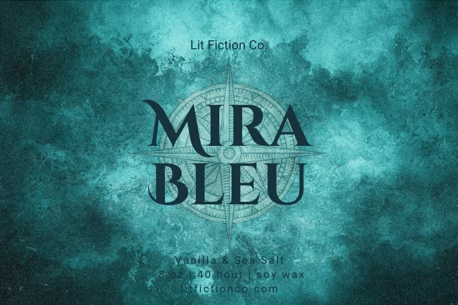 Product label for Mira Bleu with a maritime background, featuring a compass design. Labels scent as vanilla and sea salt, 8 oz, 40-hour burn time, soy wax, from Lit Fiction Co, with website litfictionco.com.