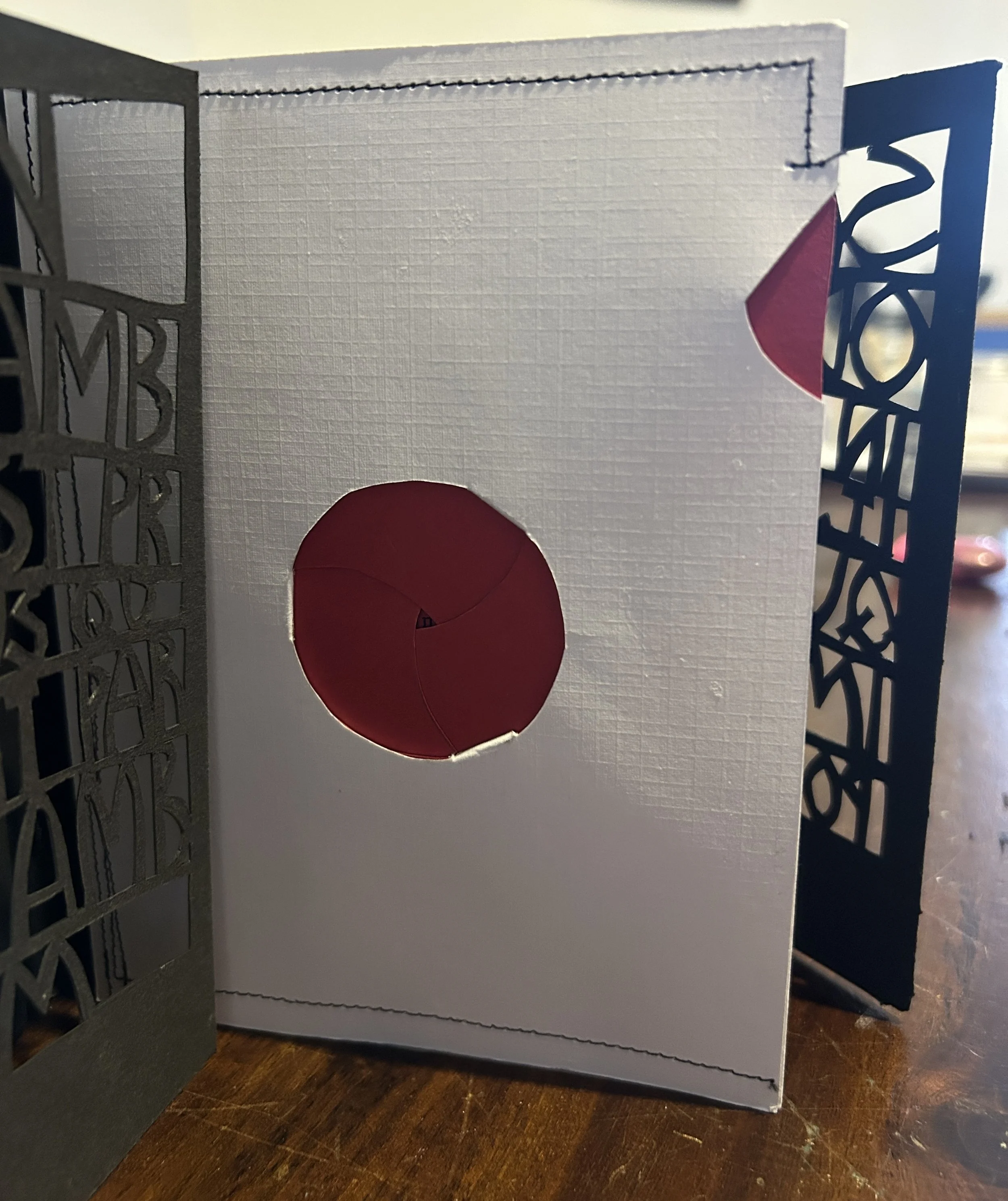 fully closed red circle with a red leaver on the side.