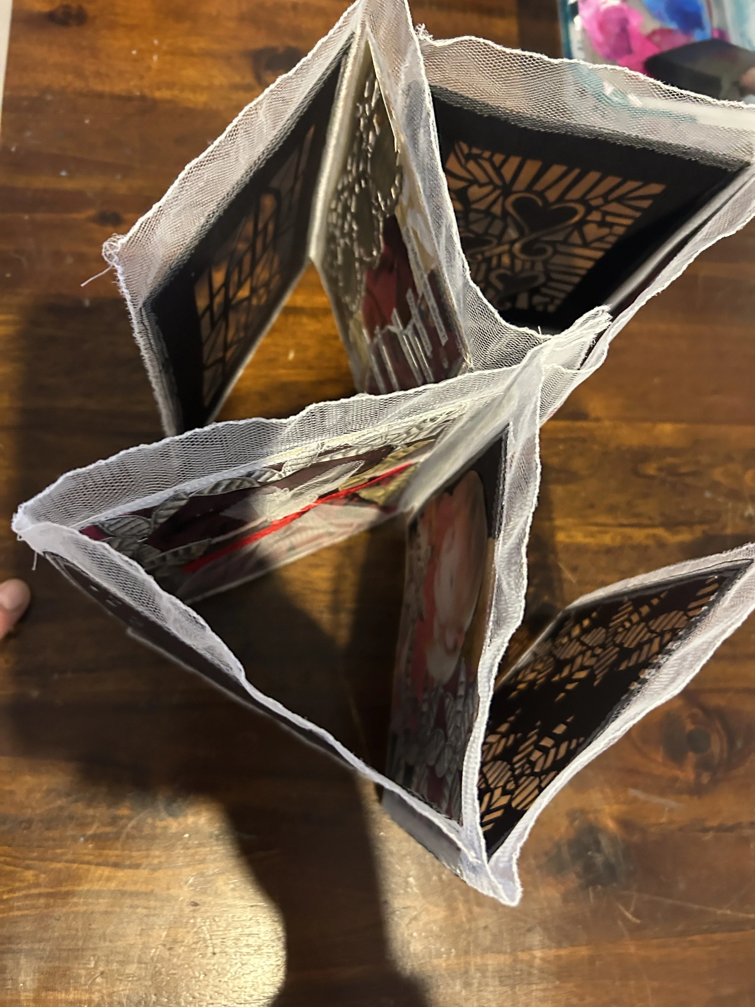 Top view of this art book using fabric as the bind.