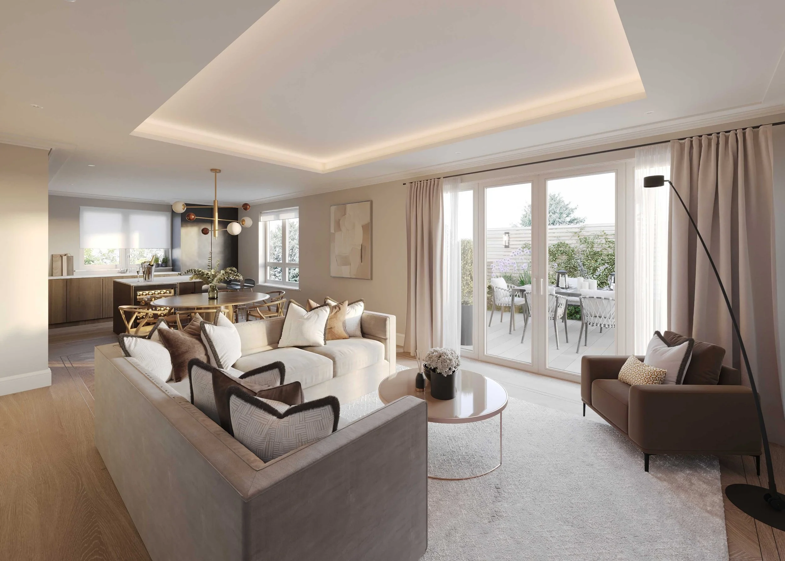Living room view with a beige sofa, black and beige chairs, round coffee table, large windows with curtains, and a dining area in the background with a chandelier, kitchen counter, and outdoor patio.