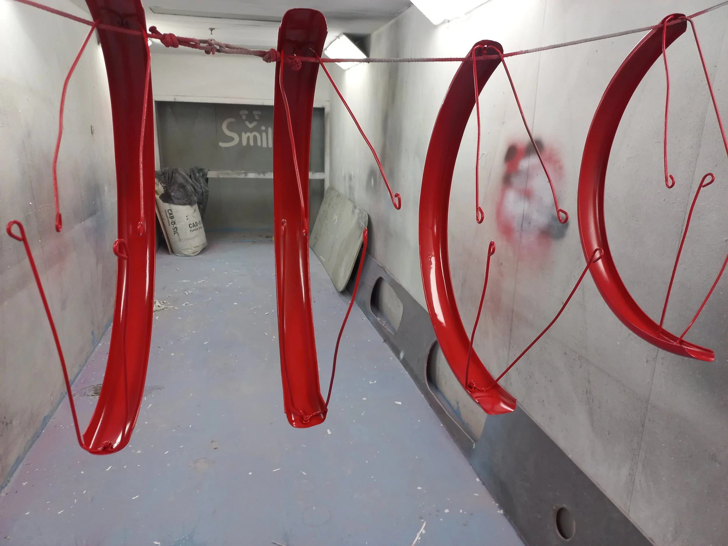 HR Productions custom props, plinths, high gloss red with high gloss pedestal base. High end retail installation. Sydney, custom built. 