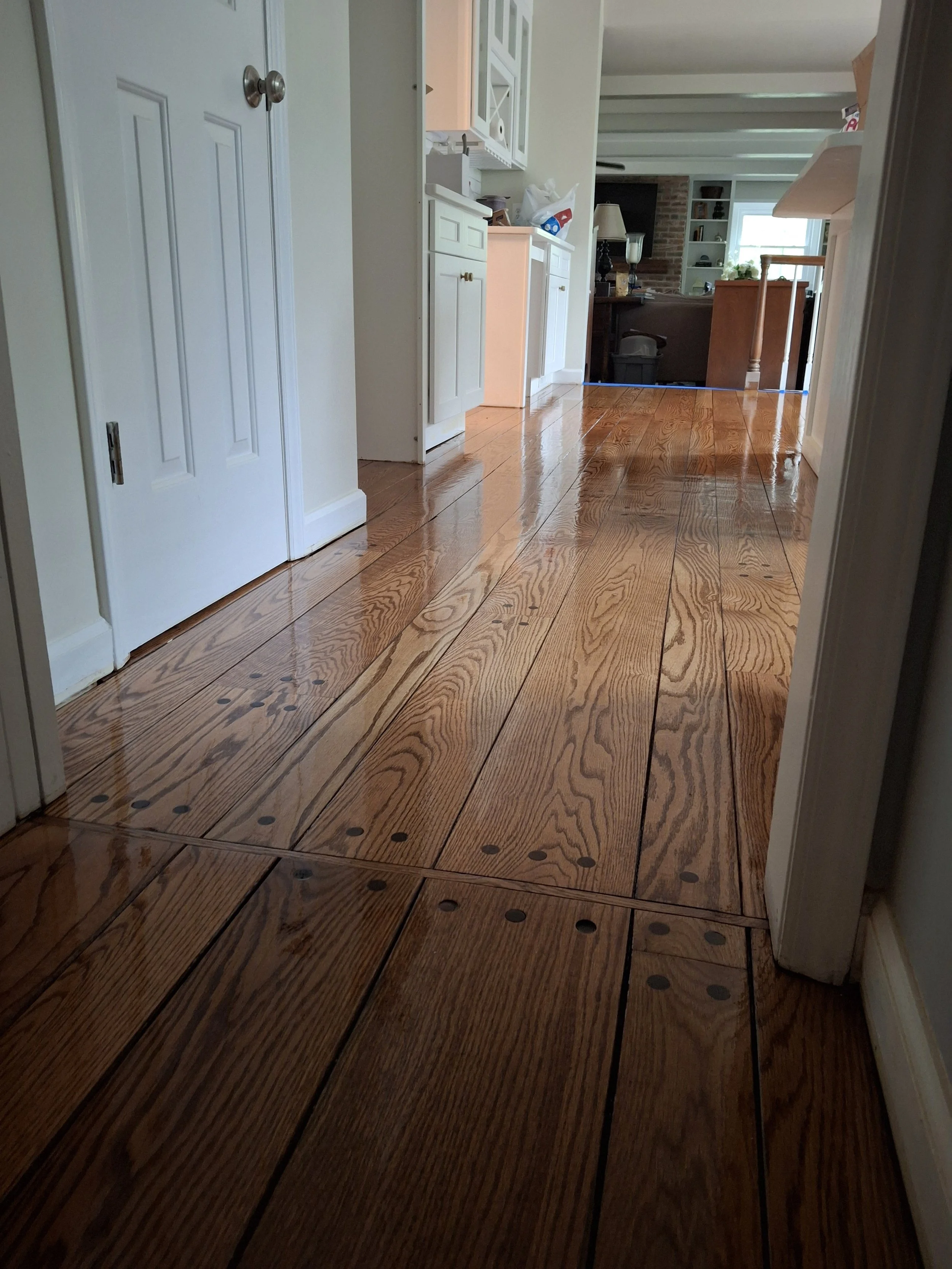 Professional flooring installation by Floyd's Flooring & Stairs featuring luxury vinyl plank (LVP), hardwood flooring, laminate flooring, engineered hardwood, stair refinishing, subfloor repair, and custom flooring services in Winston-Salem, NC