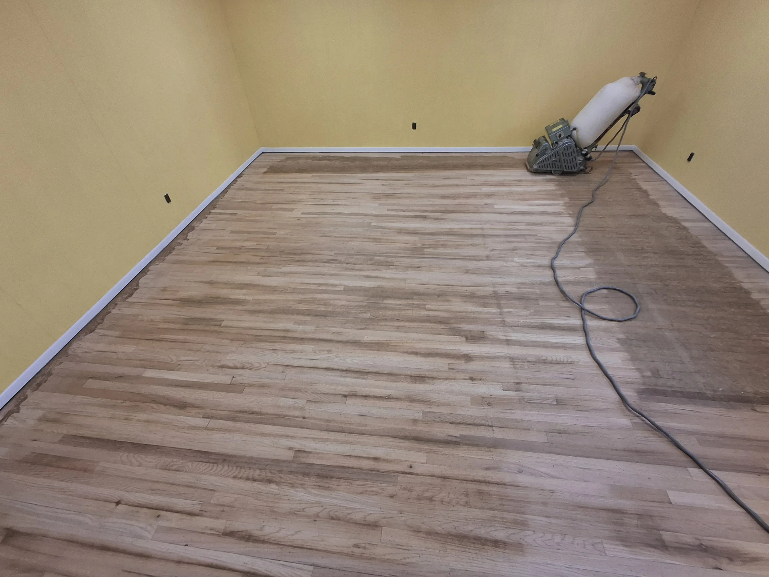 Residential flooring project completed by Floyd's Flooring & Stairs. Expert installation of hardwood flooring, luxury vinyl plank, engineered hardwood, stair renovations, floor repairs, and flooring remodels throughout the Piedmont and Triad, NC