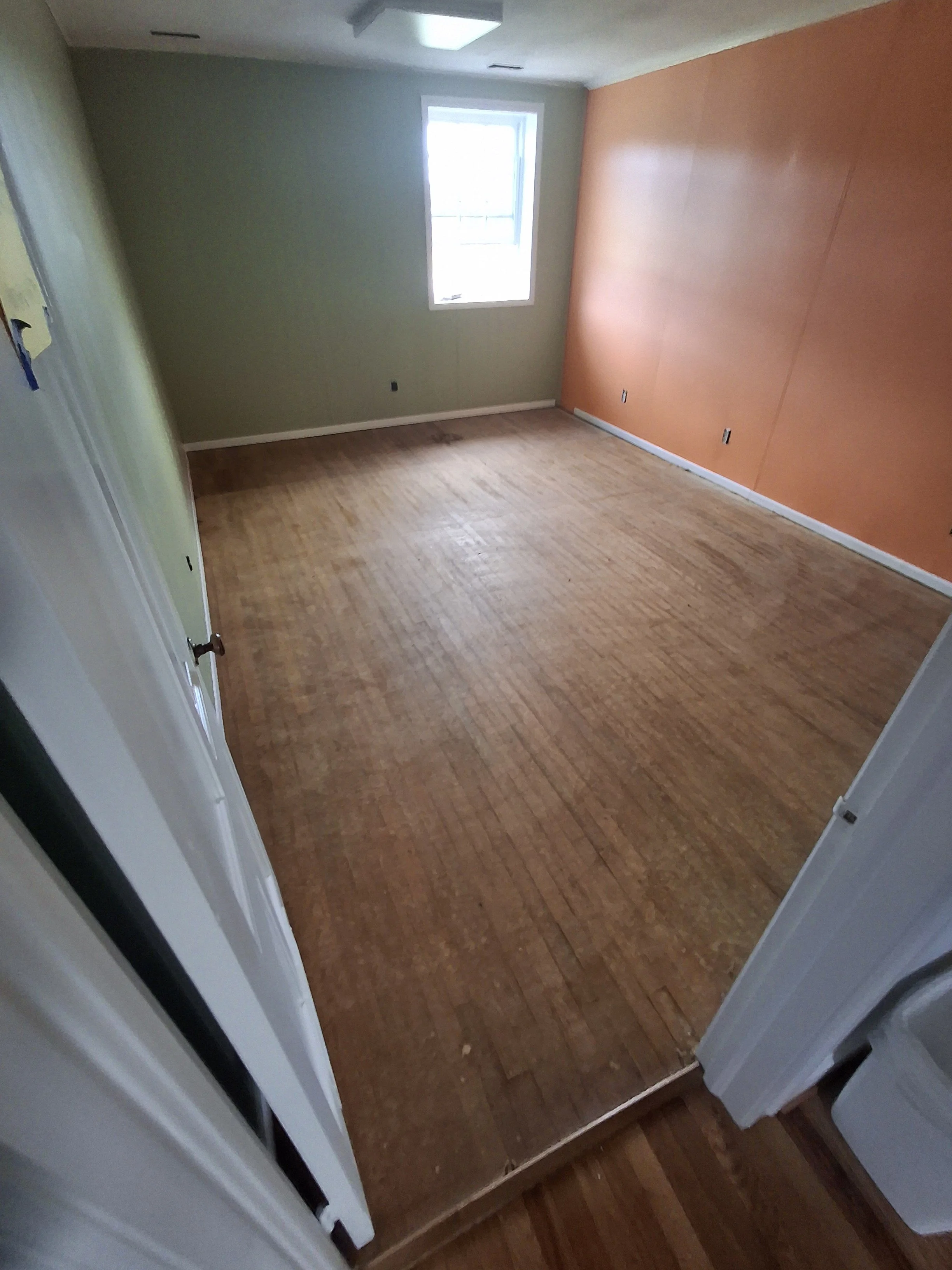 Residential flooring project completed by Floyd's Flooring & Stairs. Expert installation of hardwood flooring, luxury vinyl plank, engineered hardwood, stair renovations, floor repairs, and flooring remodels throughout the Piedmont and Triad, NC