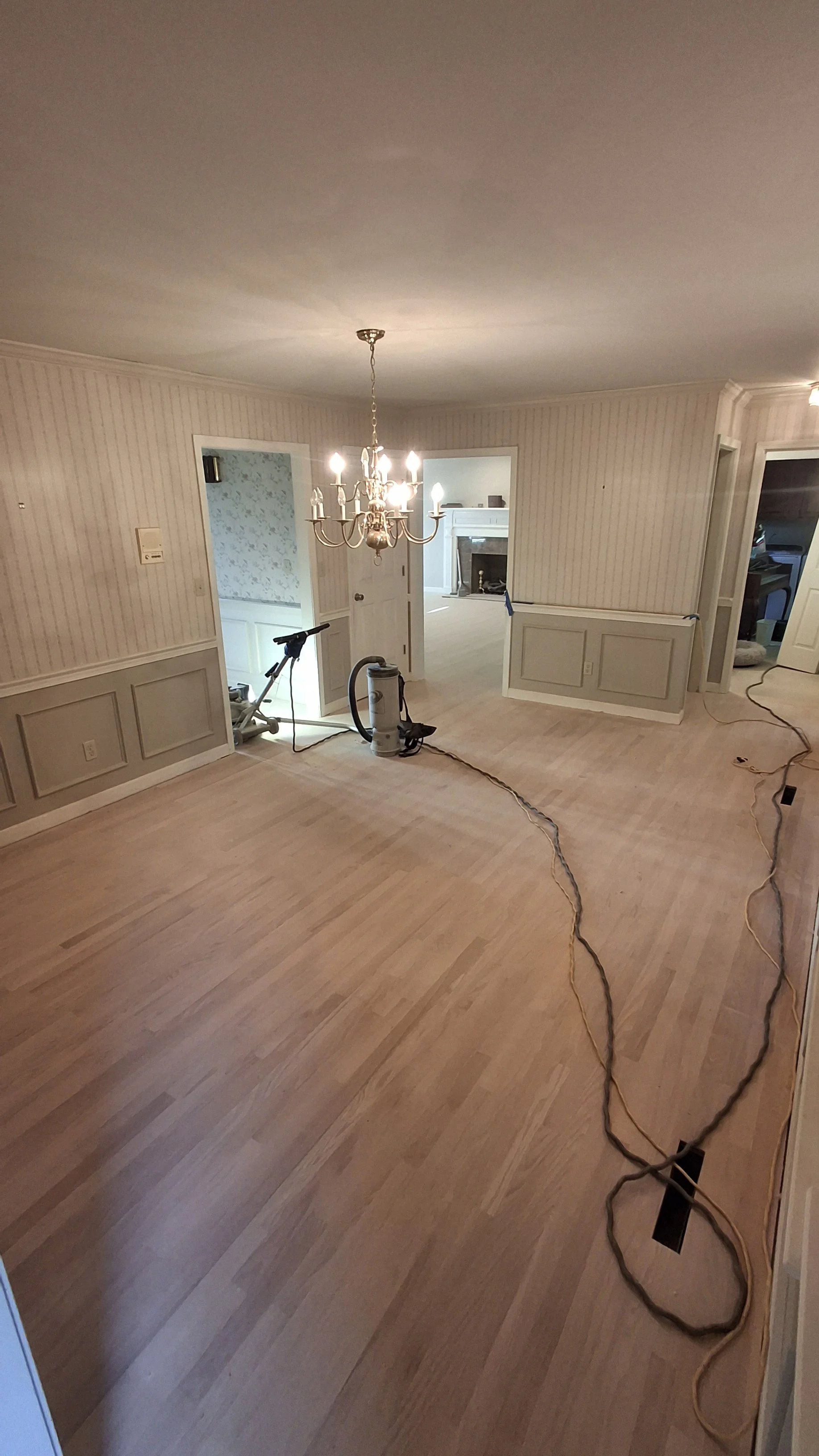 Floyd's Flooring & Stairs featuring luxury vinyl plank (LVP), hardwood flooring, laminate flooring, engineered hardwood, stair refinishing, subfloor repair, and custom flooring services in Winston-Salem, NC and surrounding areas.