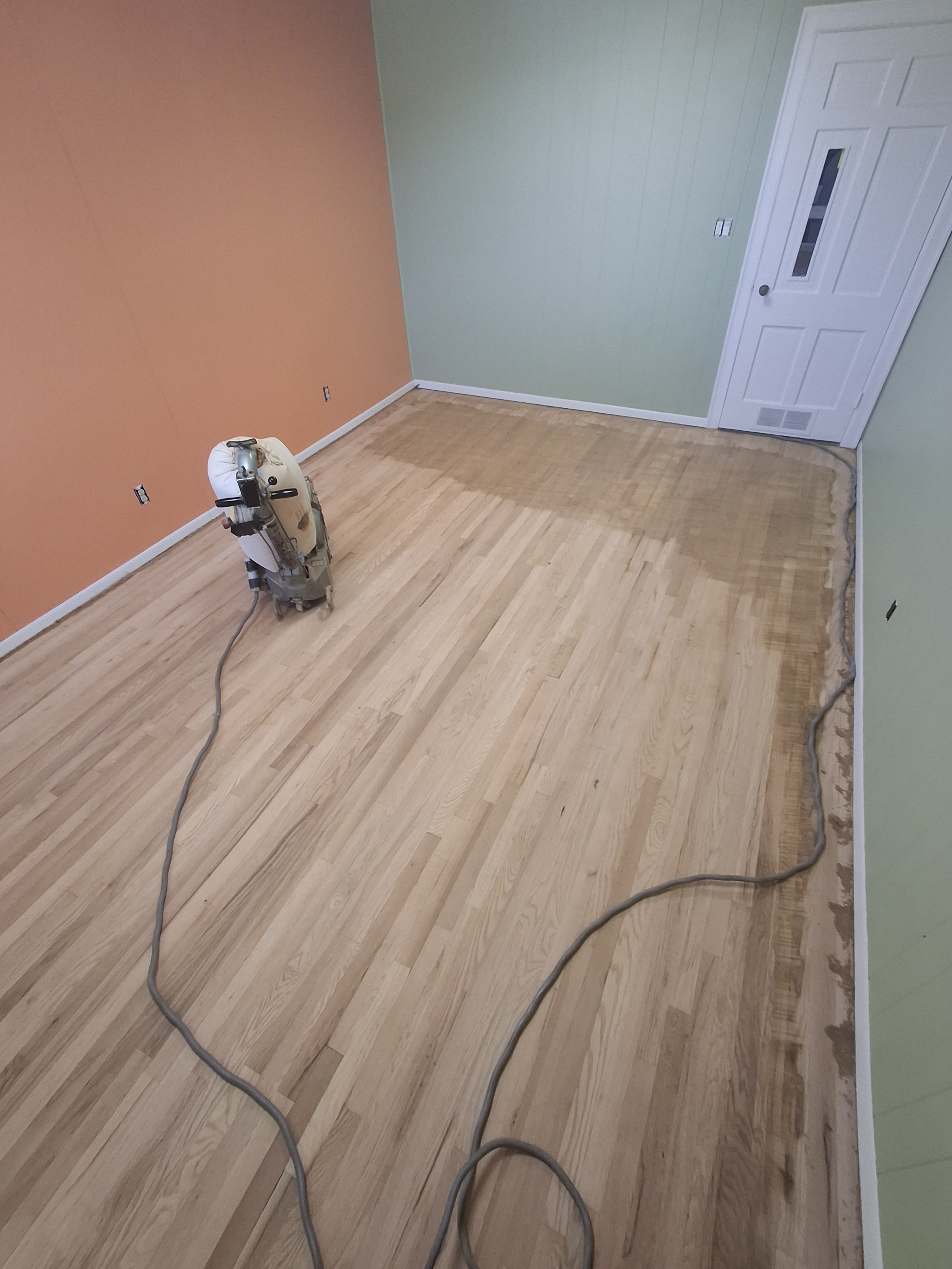 Residential flooring project completed by Floyd's Flooring & Stairs. Expert installation of hardwood flooring, luxury vinyl plank, engineered hardwood, stair renovations, floor repairs, and flooring remodels throughout the Piedmont and Triad, NC