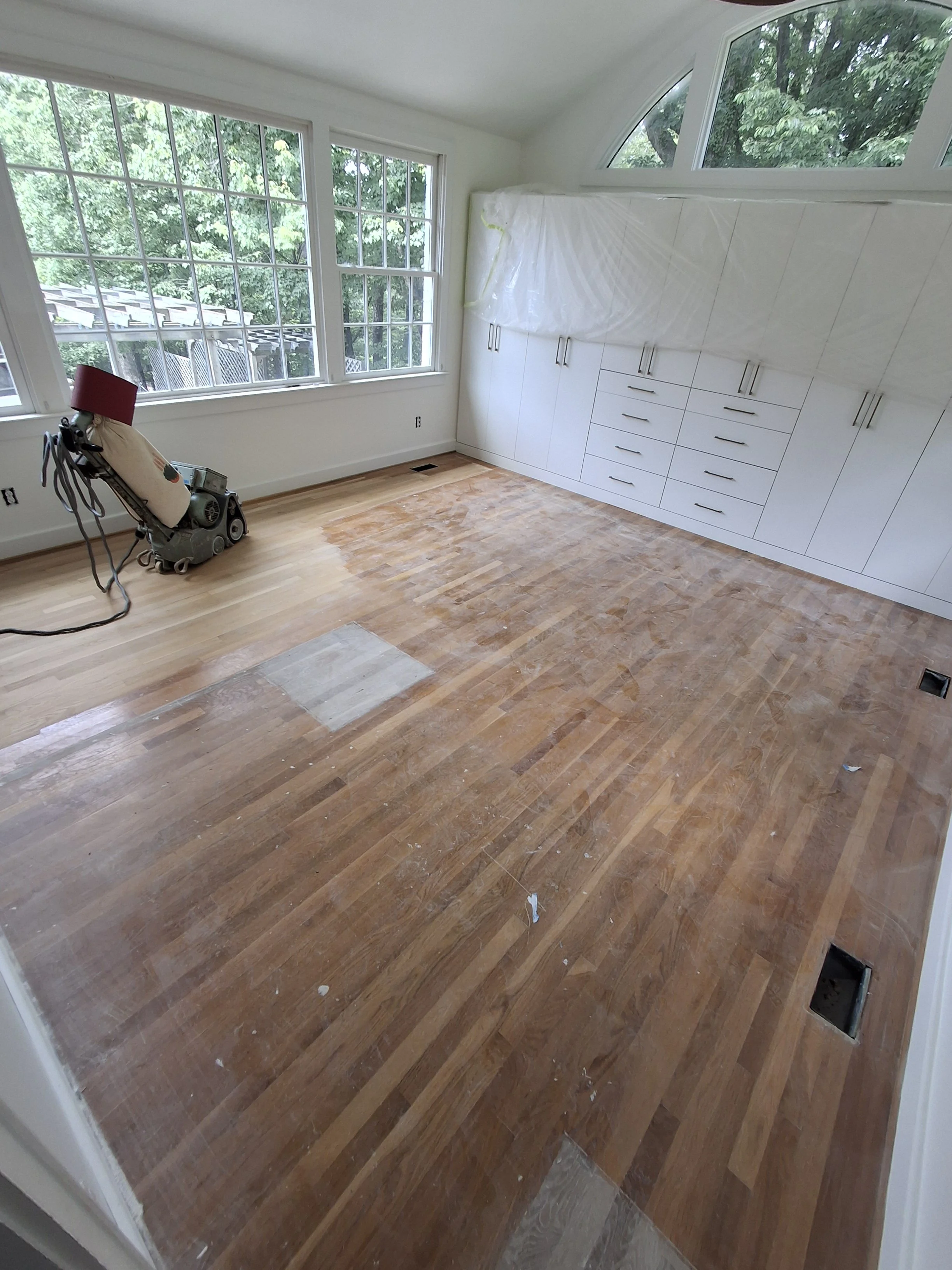 Professional flooring installation by Floyd's Flooring & Stairs featuring luxury vinyl plank (LVP), hardwood flooring, laminate flooring, engineered hardwood, stair refinishing, subfloor repair, and custom flooring services in Winston-Salem, NC