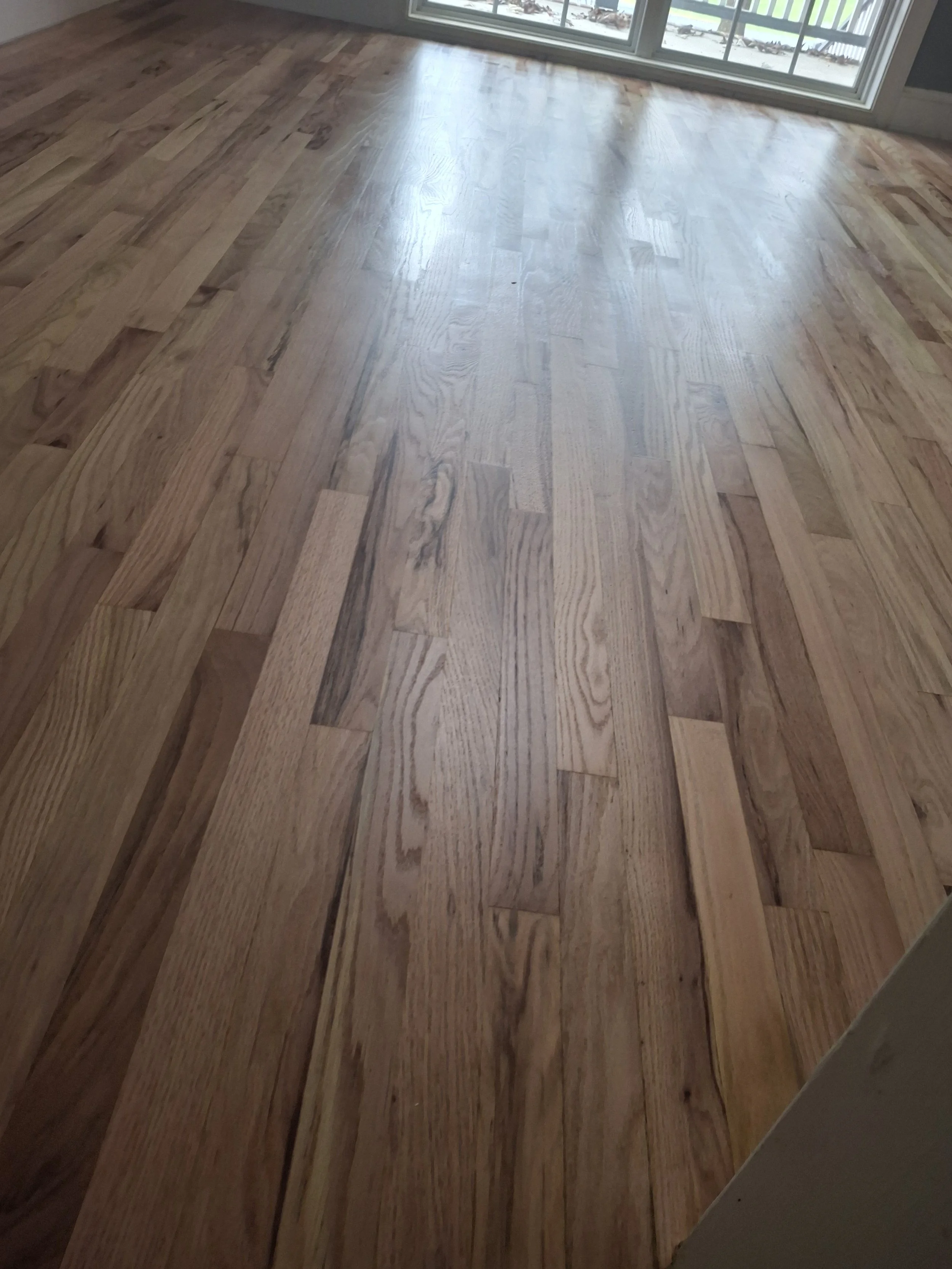 High-quality craftsmanship from Floyd's Flooring & Stairs specializing in hardwood flooring, LVP flooring, engineered hardwood, stair refinishing, floor replacement, and subfloor repair serving Winston-Salem, Greensboro, High-Point, NC