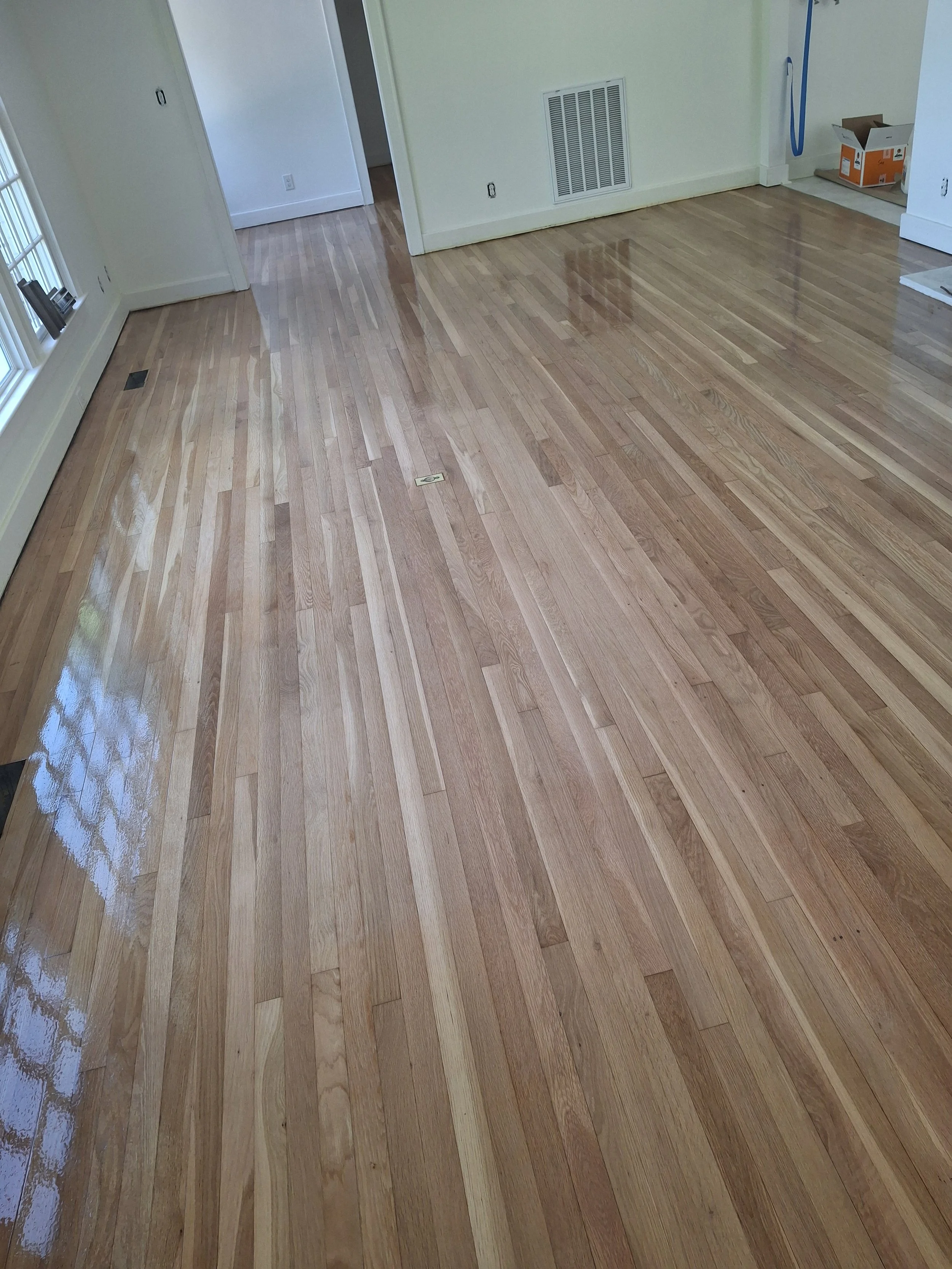 Professional flooring installation by Floyd's Flooring & Stairs featuring luxury vinyl plank (LVP), hardwood flooring, laminate flooring, engineered hardwood, stair refinishing, subfloor repair, and custom flooring services in Winston-Salem, NC