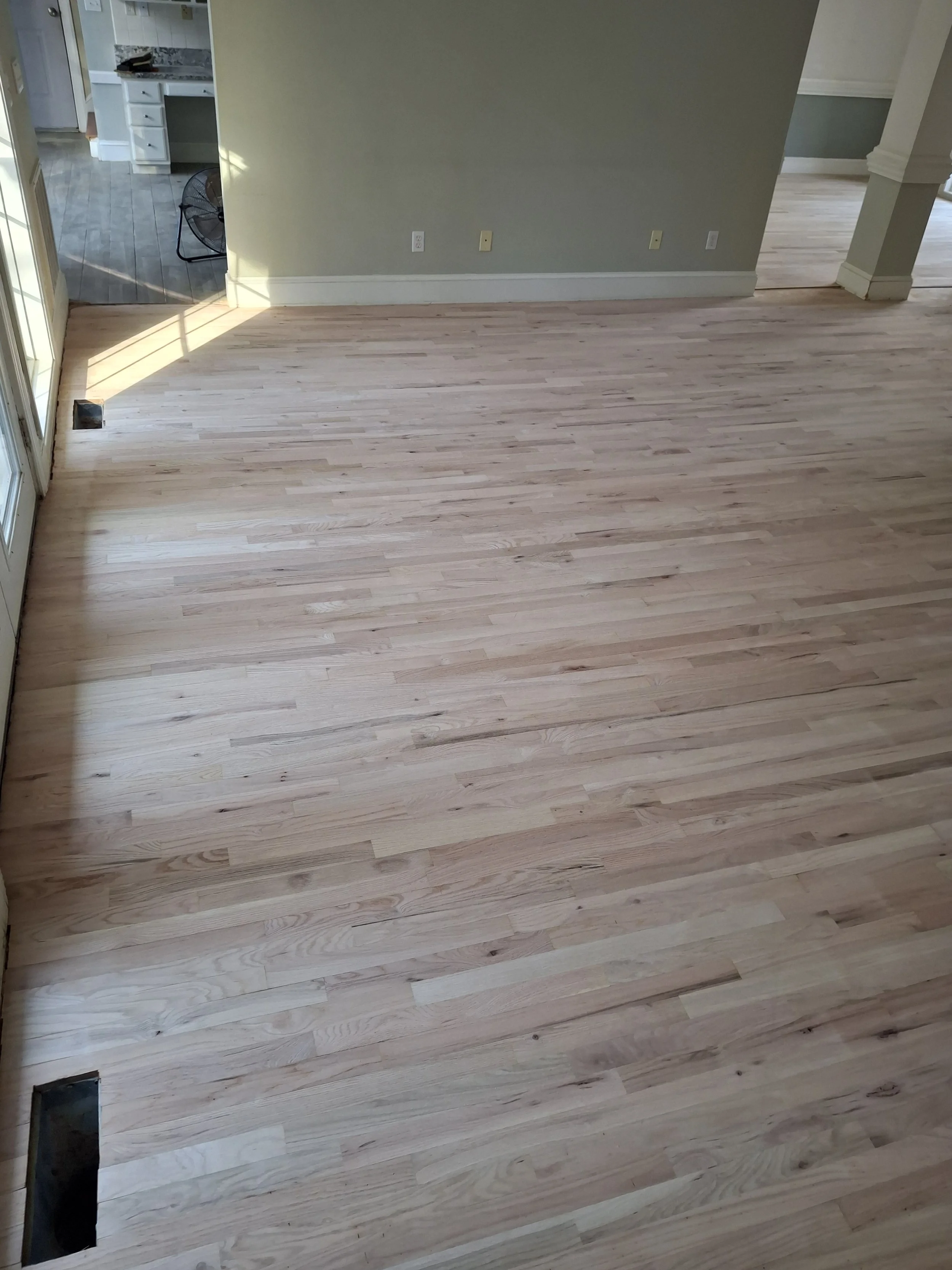 High-quality craftsmanship from Floyd's Flooring & Stairs specializing in hardwood flooring, LVP flooring, engineered hardwood, stair refinishing, floor replacement, and subfloor repair serving Winston-Salem, Greensboro, High-Point, NC