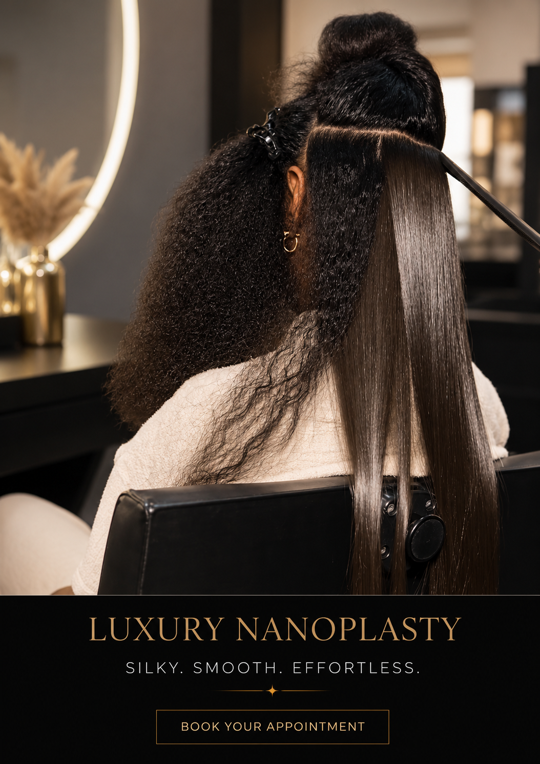 Hairdresser applying hair treatment to a customer's long, straight hair at a salon.
