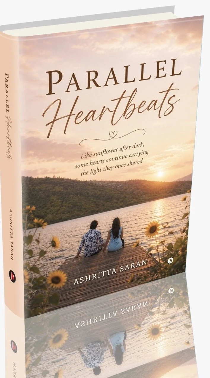 Parallel Heartbeats book cover by Ashritta Saran — a couple sitting by a lake at sunset surrounded by flowers, debut Lucknow-set romance novel.