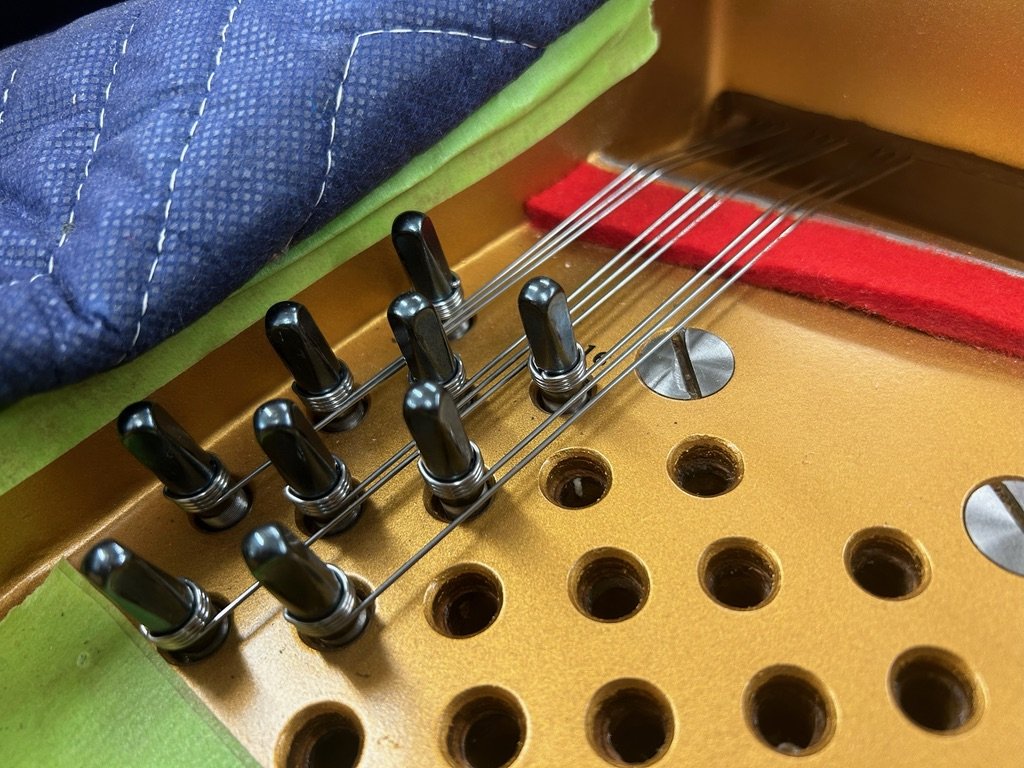 piano restringing treble wire.jpeg