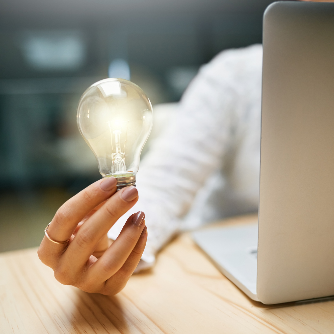A lightbulb being held to signify a lightbulb moment for digital marketing strategy