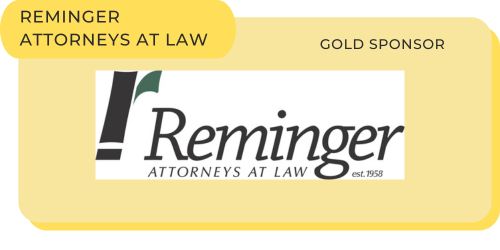 Reminger Attorneys at Law Gold Sponsor signage with logo and description.