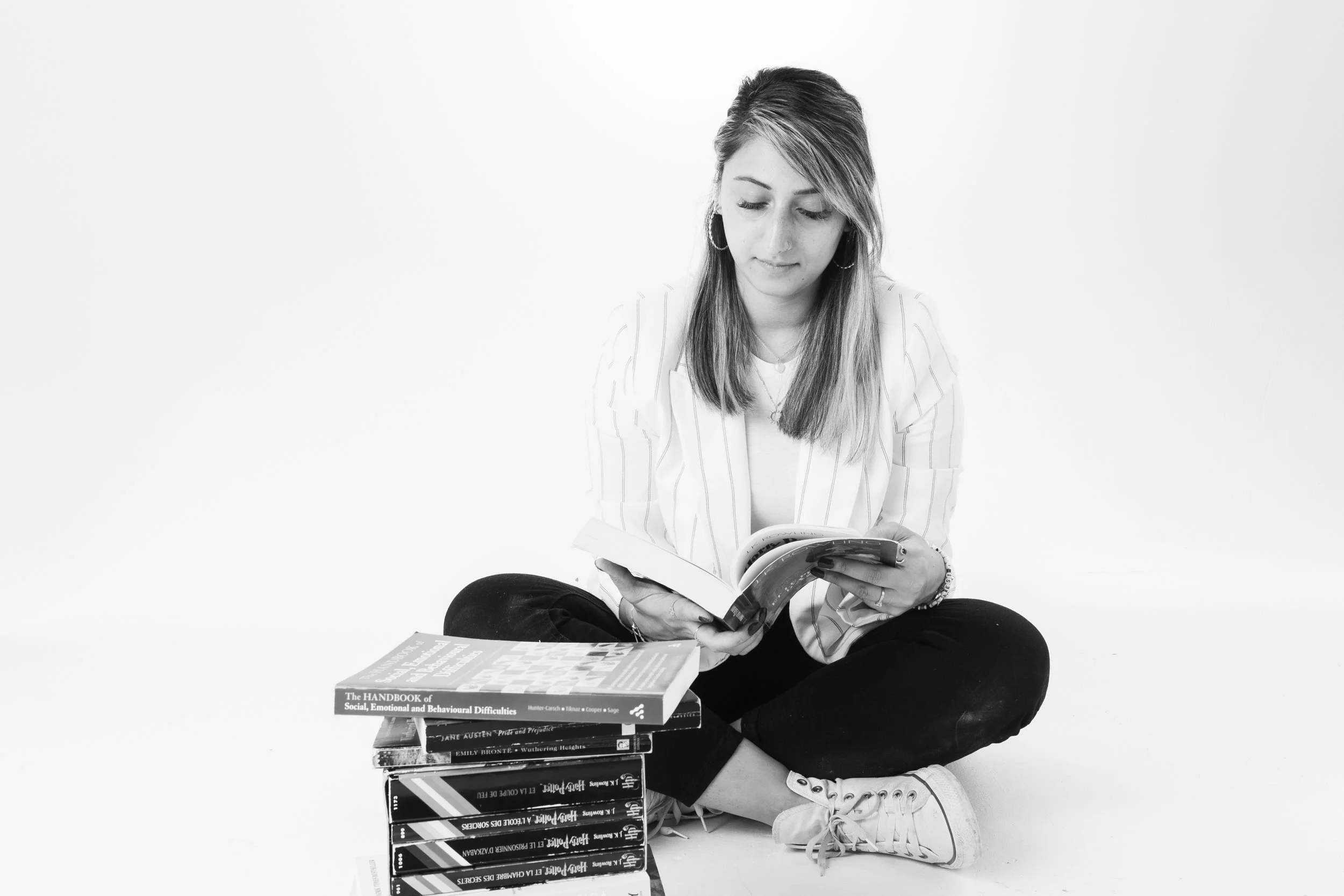 Aiysha reading psychology and behavioural research, exploring the science behind student self-criticism and inner dialogue