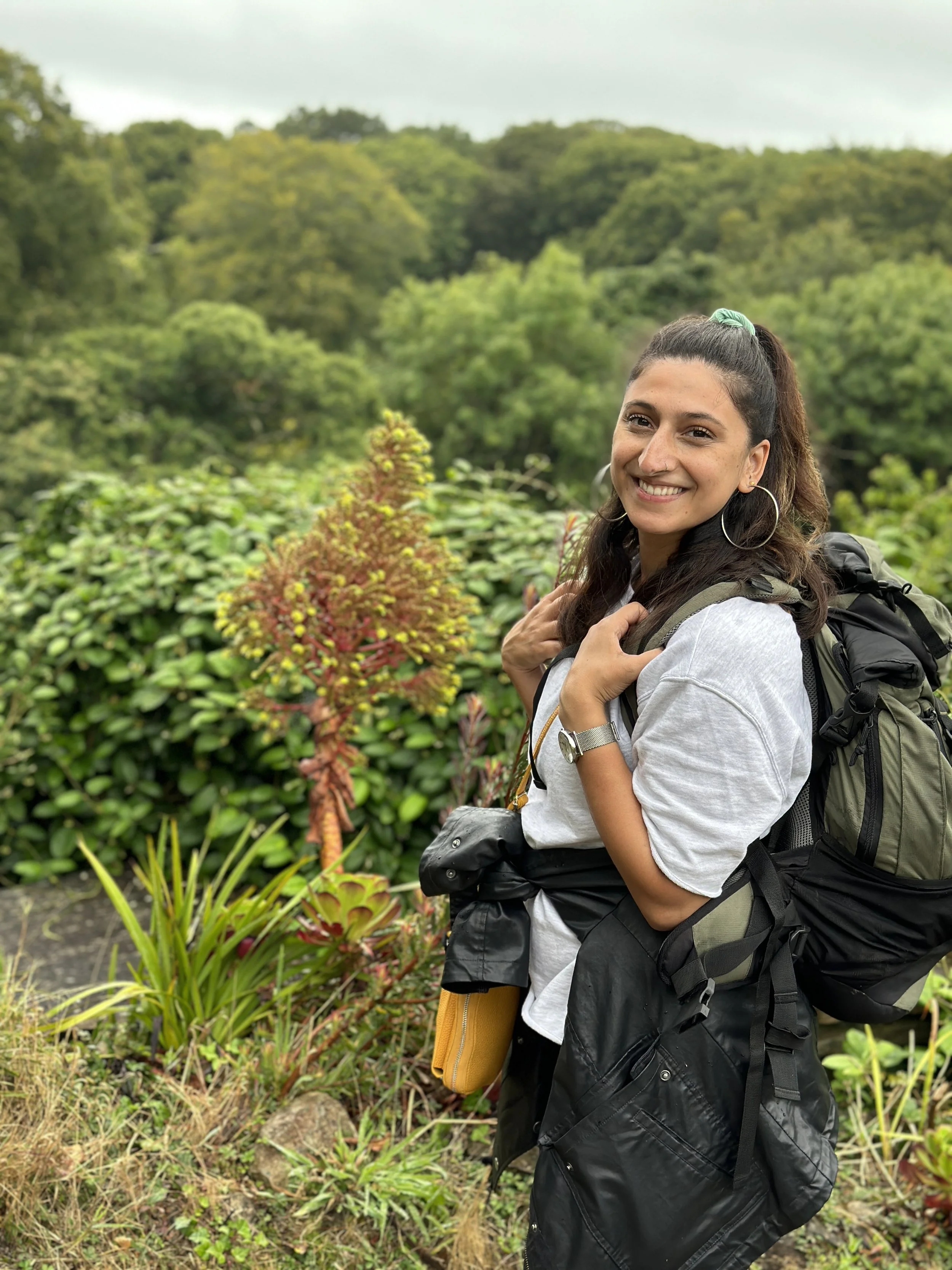 Aiysha hiking outdoors, reflecting on her personal journey with anxiety and confidence