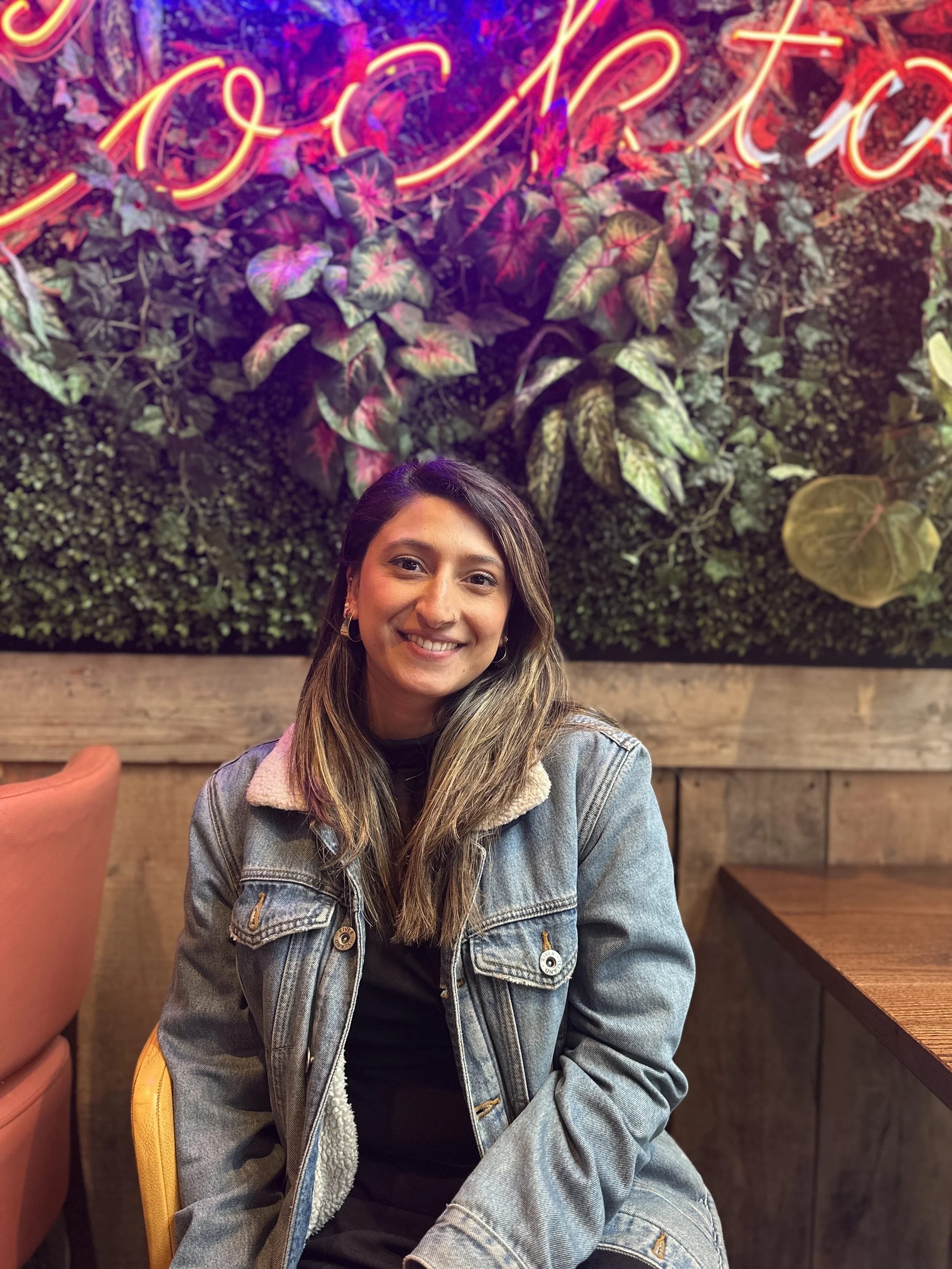 Aiysha, founder of Ignite with Aiysh, smiling — registered brain coach and educational psychology doctoral candidate