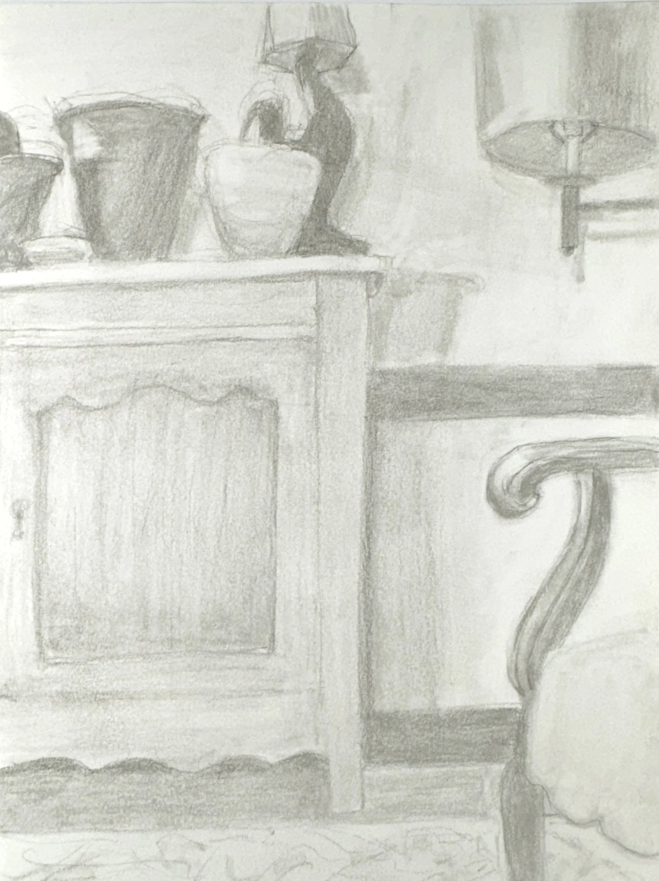 A pencil sketch of a room with a dresser holding three vases and a small sculpture, and a table lamp on the right side.