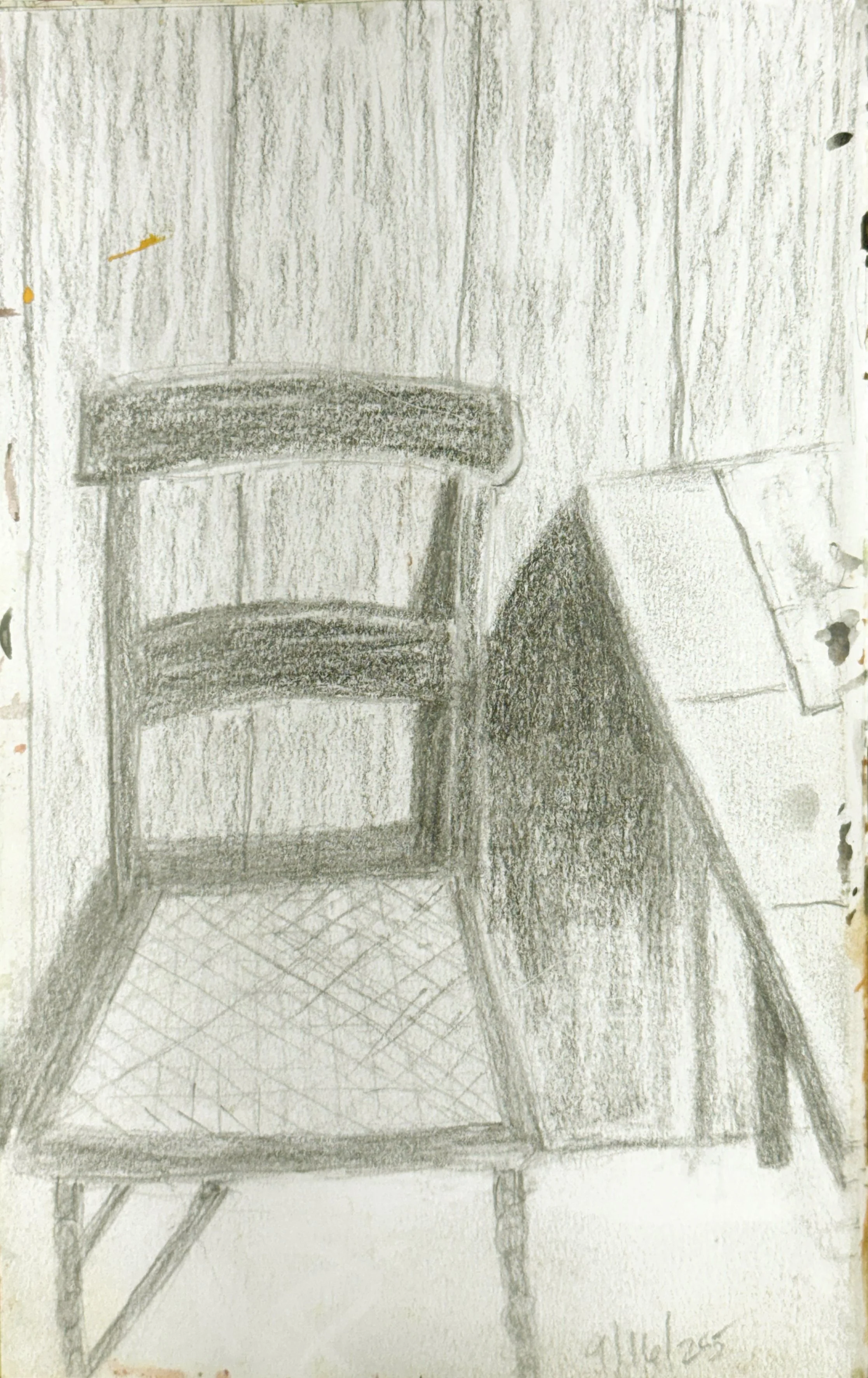A pencil sketch of a wooden table with a curved chair near a wall, featuring textured floor tiles and detailed shading.